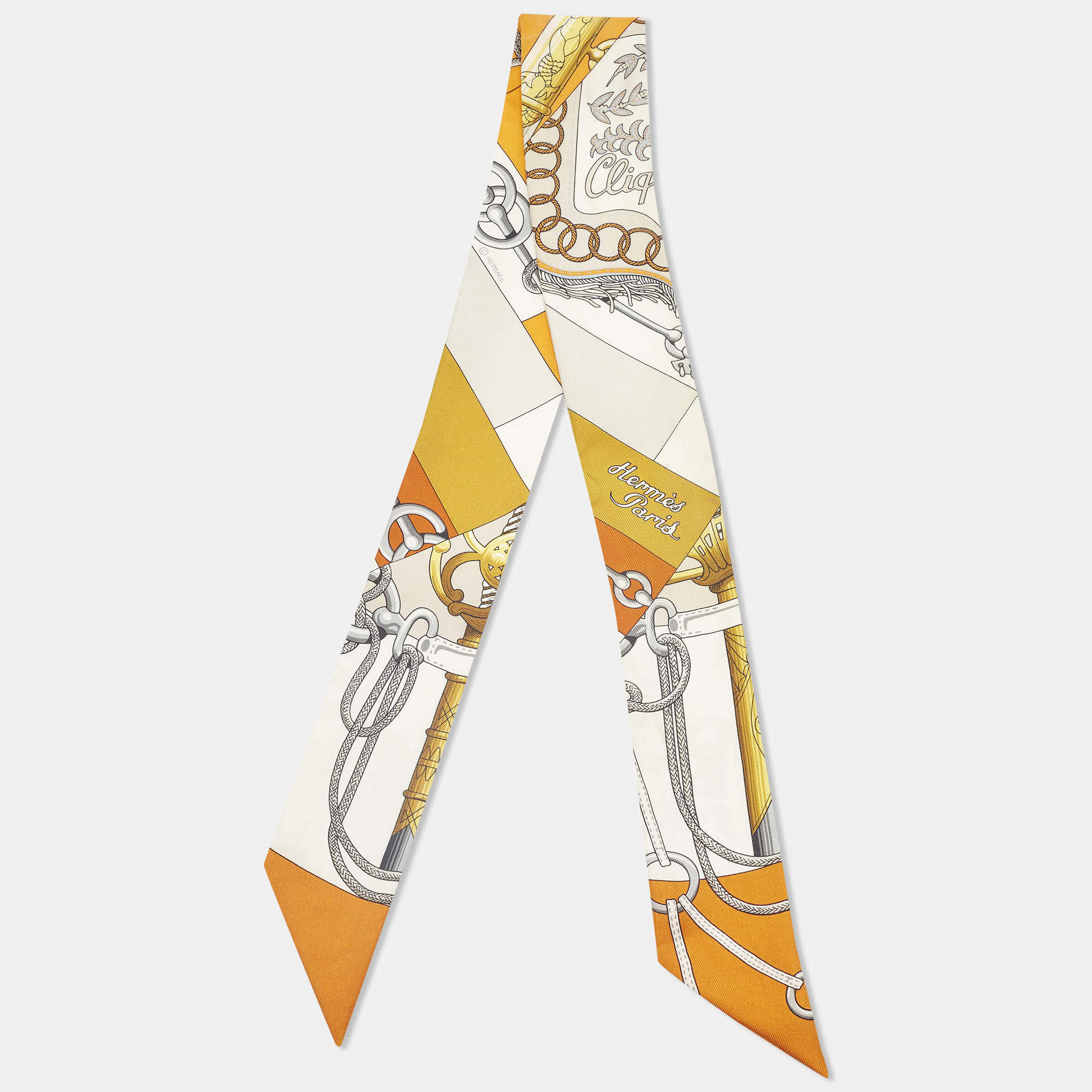 Pre Owned Hermès Orange Printed Silk Twilly