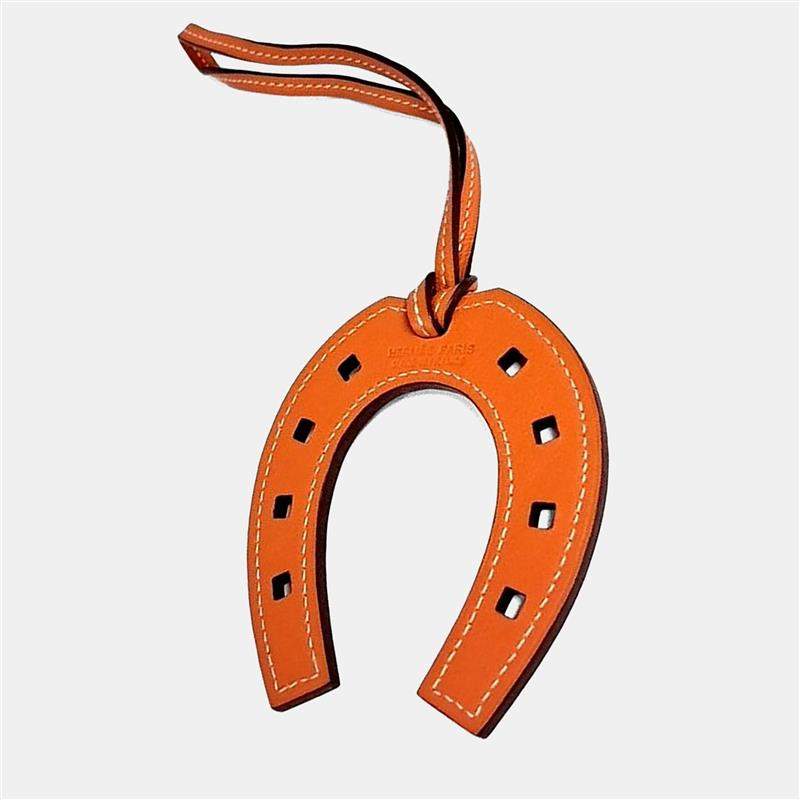 Pre Owned Hermes Orange Leather Horseshoe Bag Charm