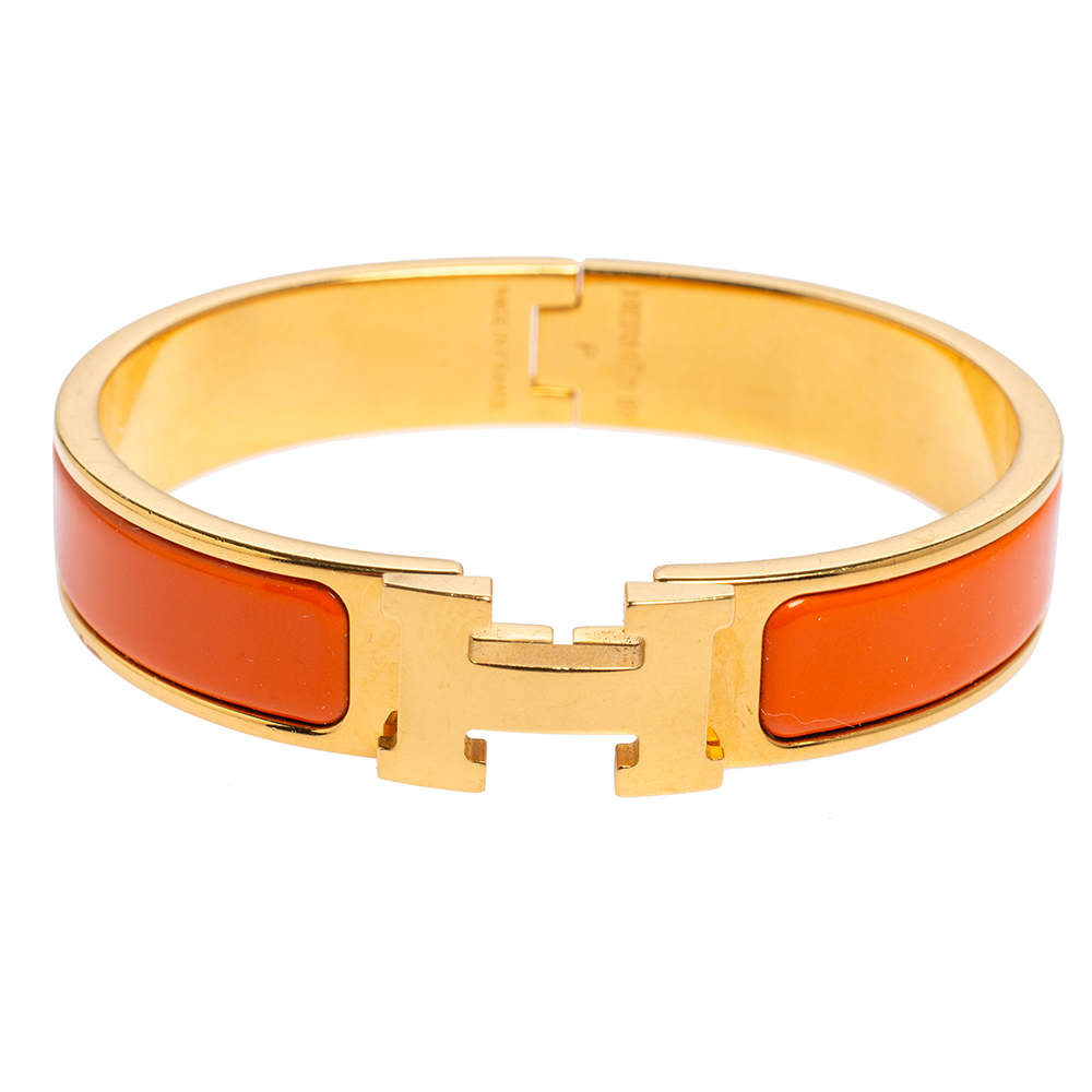 Pre Owned Hermès Clic H Orange Enamel Gold Plated Narrow Bracelet PM