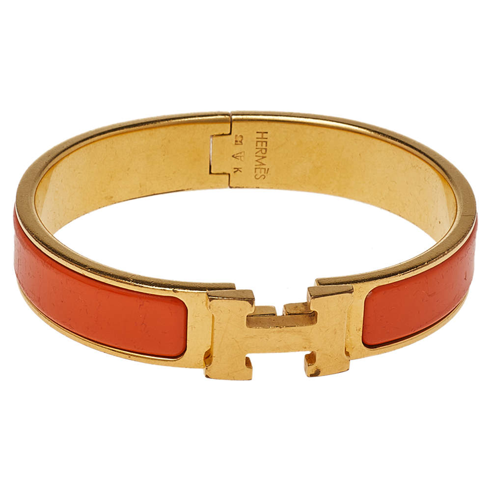Pre Owned Hermès Clic H Orange Enamel Gold Plated Narrow Bracelet PM