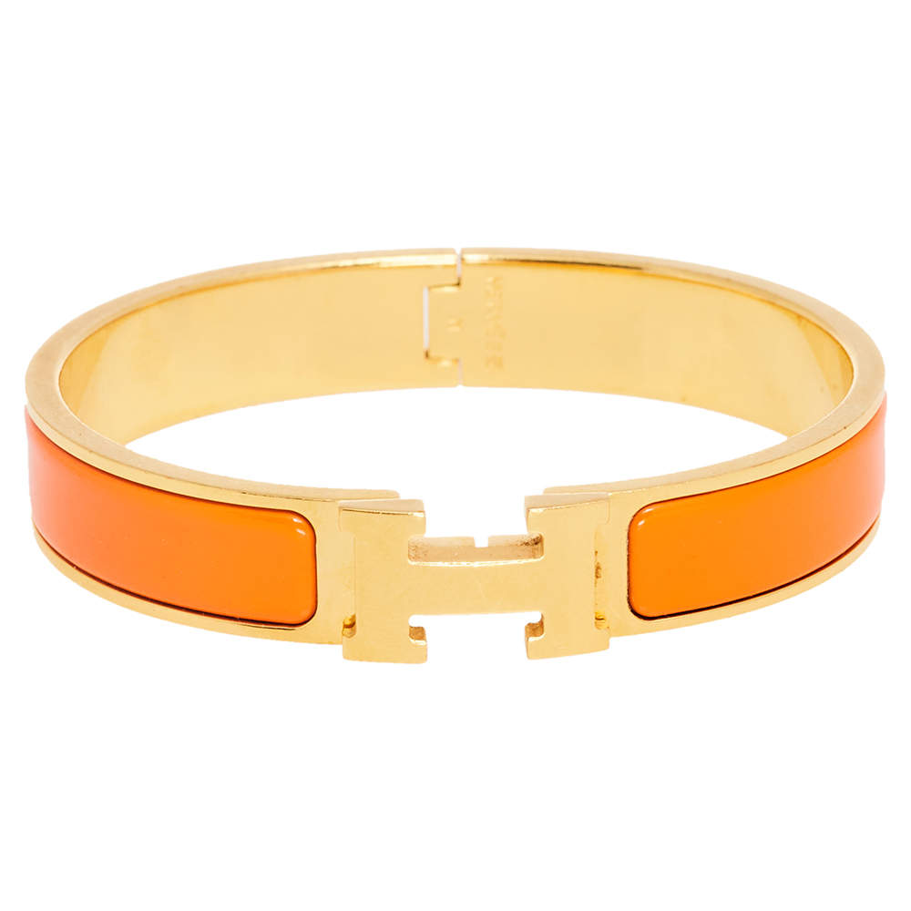 Pre Owned Hermès Clic H Orange Enamel Gold Plated Narrow Bracelet M