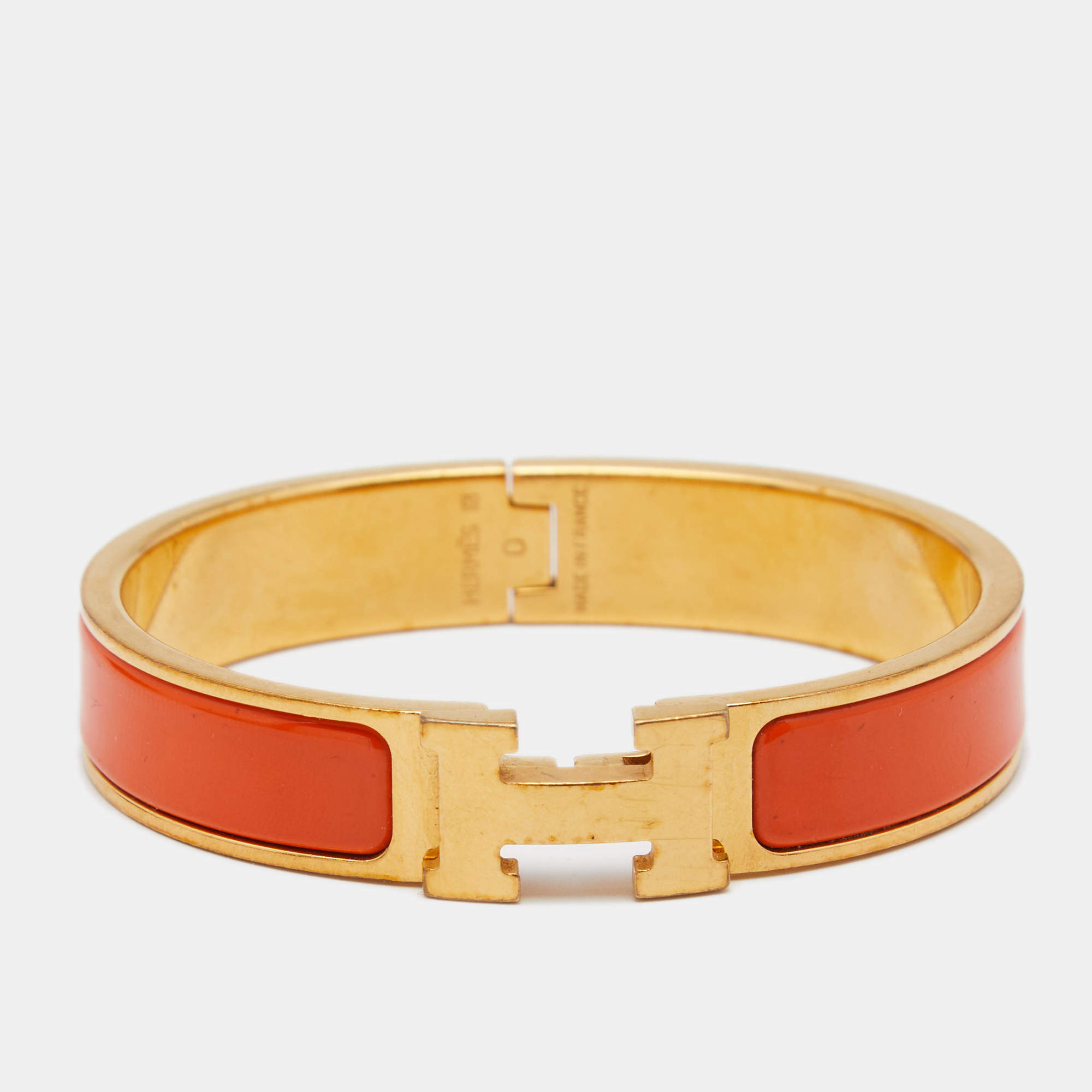 Pre Owned Hermes Clic H Gold Plate Orange Enamel Cuff Bracelet PM