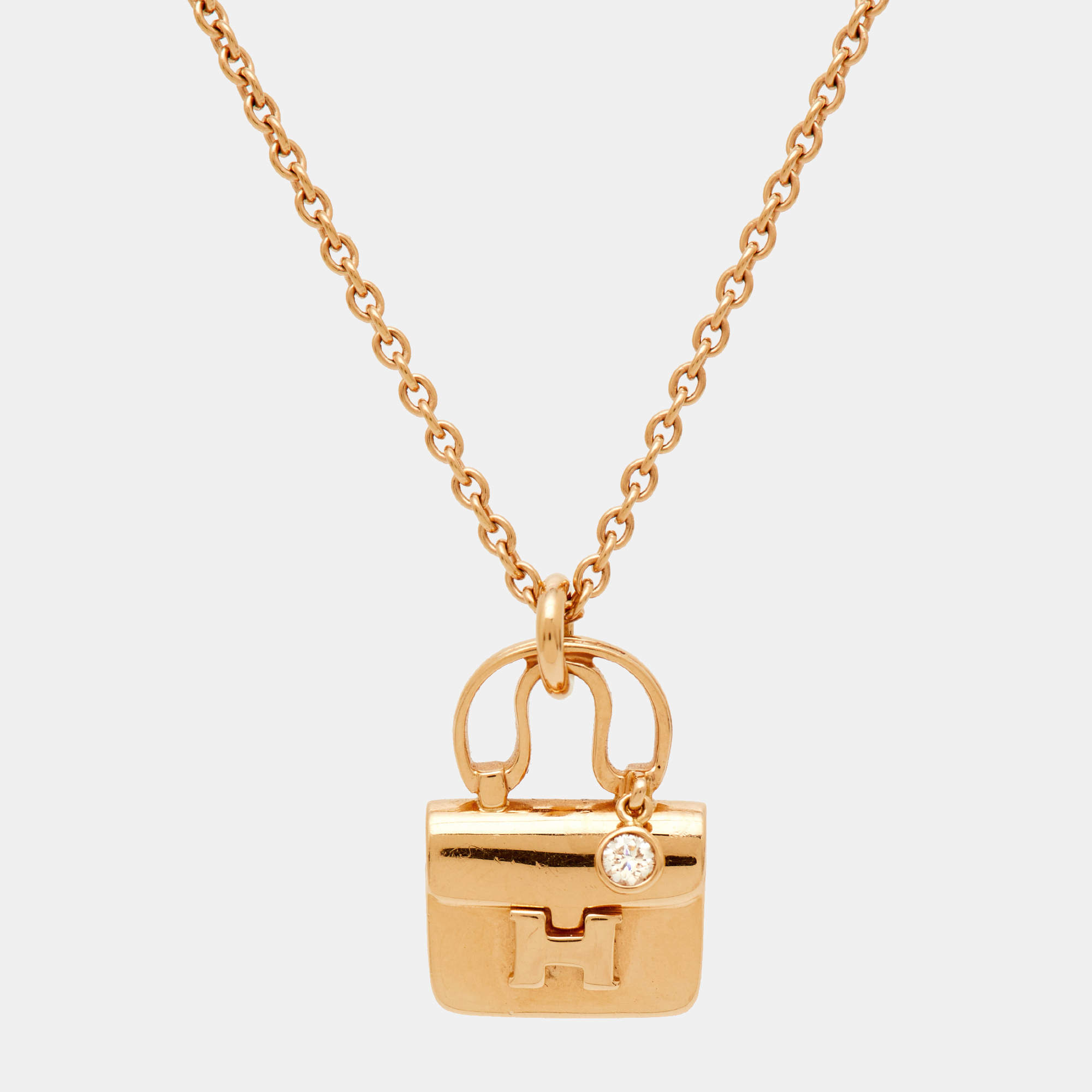 Pre Owned Hermes Diamond Charm Constance Amulette 18K Rose Gold Pendant Necklace