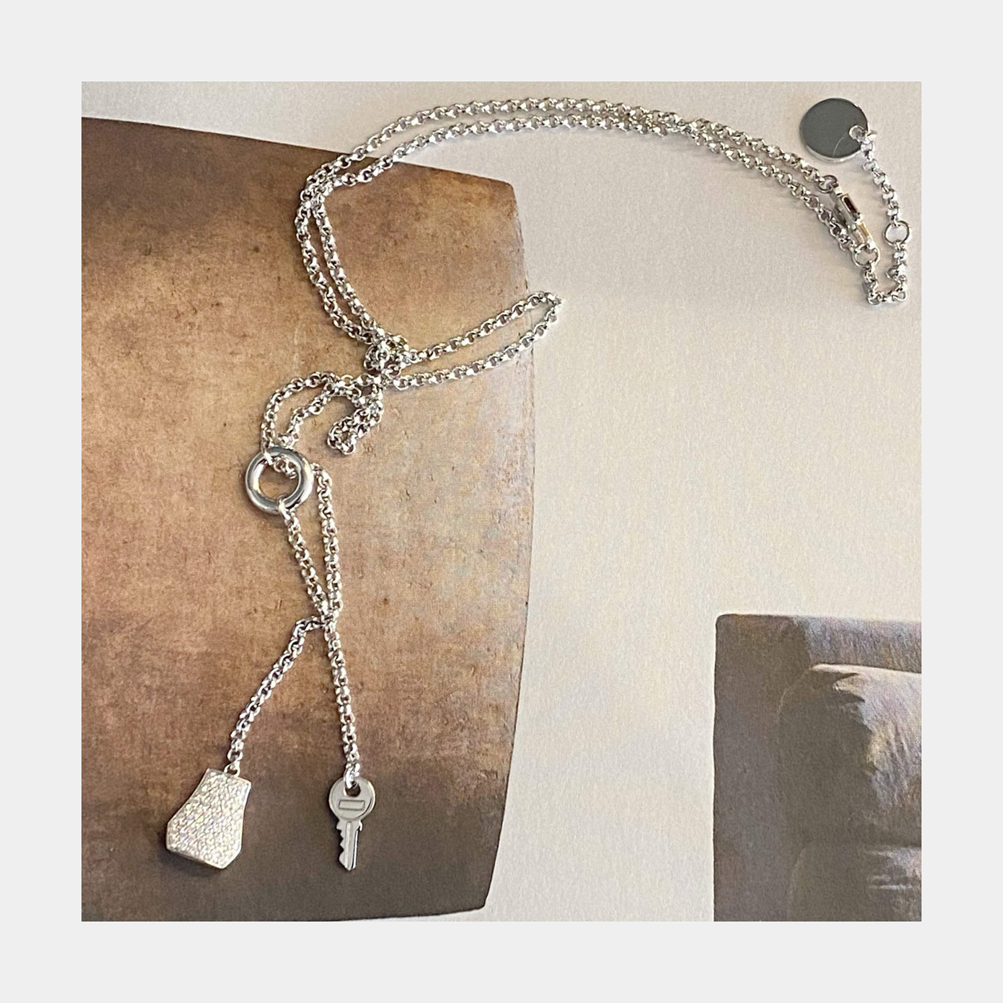 مملوكة مسبقًا Hermes Kelly Clochette Long Necklace 18K White Gold Diamond Set