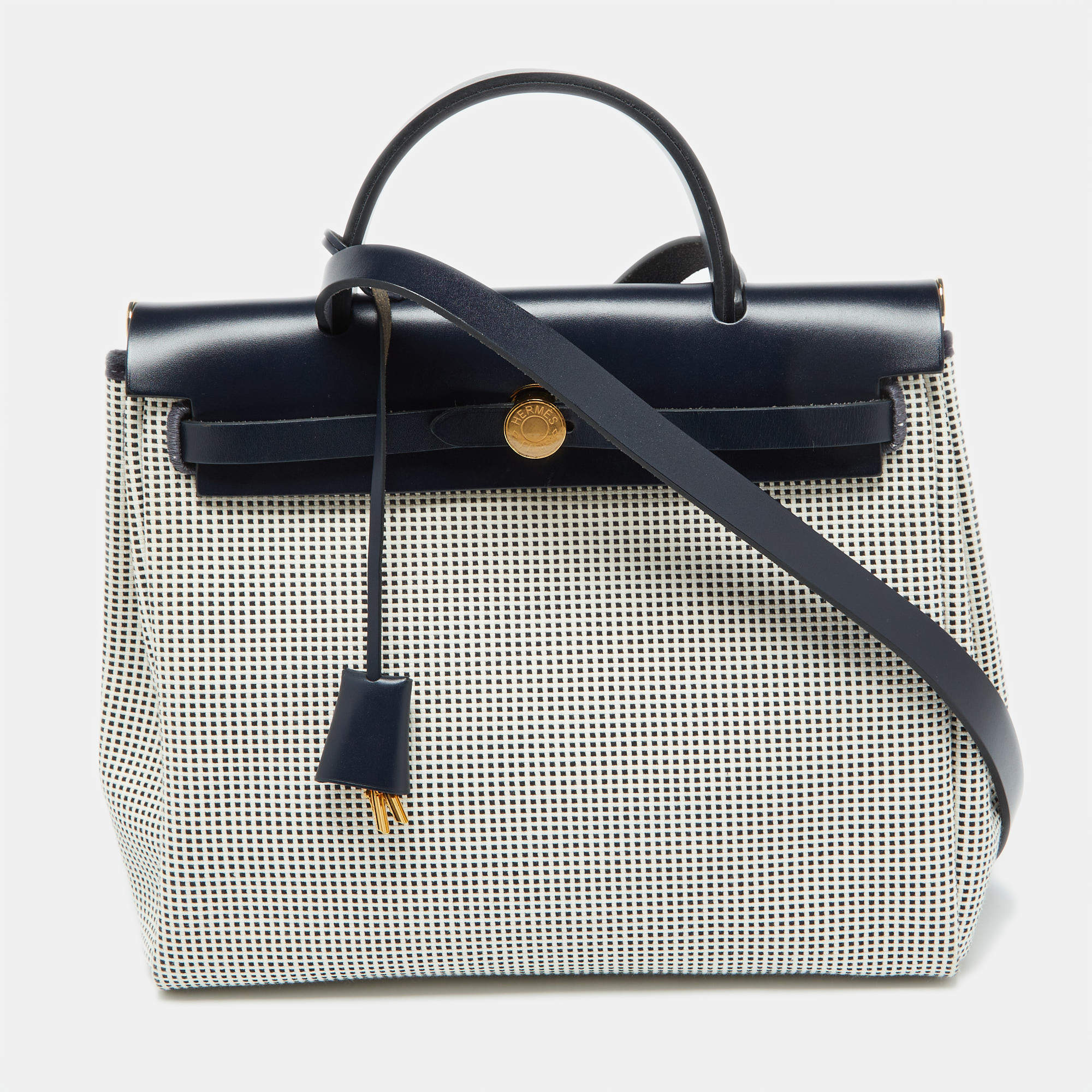 Pre Owned Hermès Ecru Blanc Noir/Bleu Indigo Vache Hunter/Toile Quadrille Viking Leather Herbag Zip Retourne 31 Bag