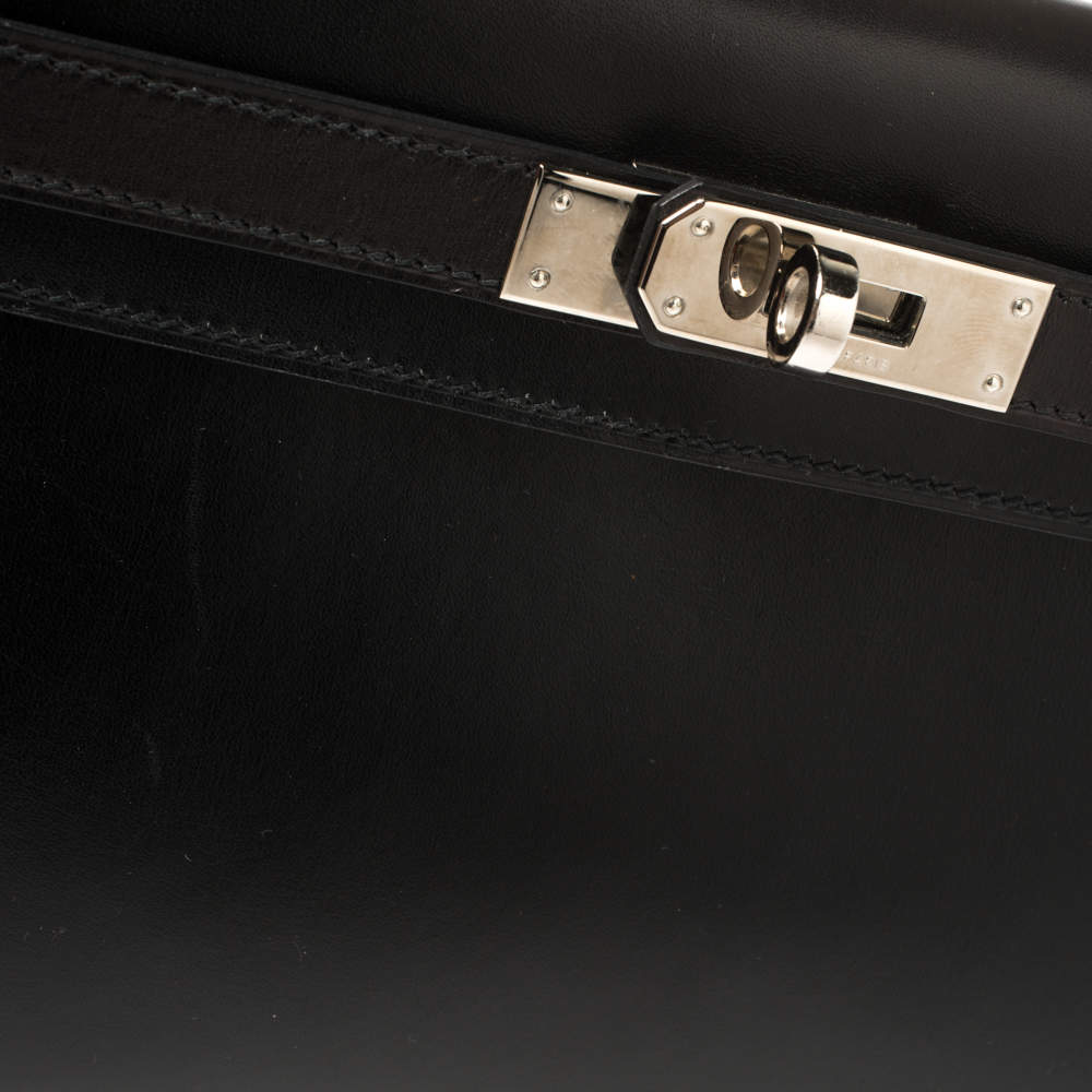 HERMÈS, BLACK KELLY RETOURNÉ 35 IN BOX CALF LEATHER WITH PALLADIUM  HARDWARE, 2009, Handbags and Accessories, 2020