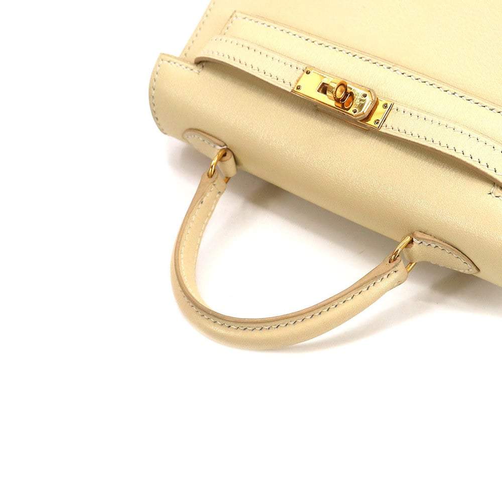 Hermes mini Kelly 15 2way hand shoulder bag box calf ivory outside sewing  Mini Hermes | The Luxury Closet