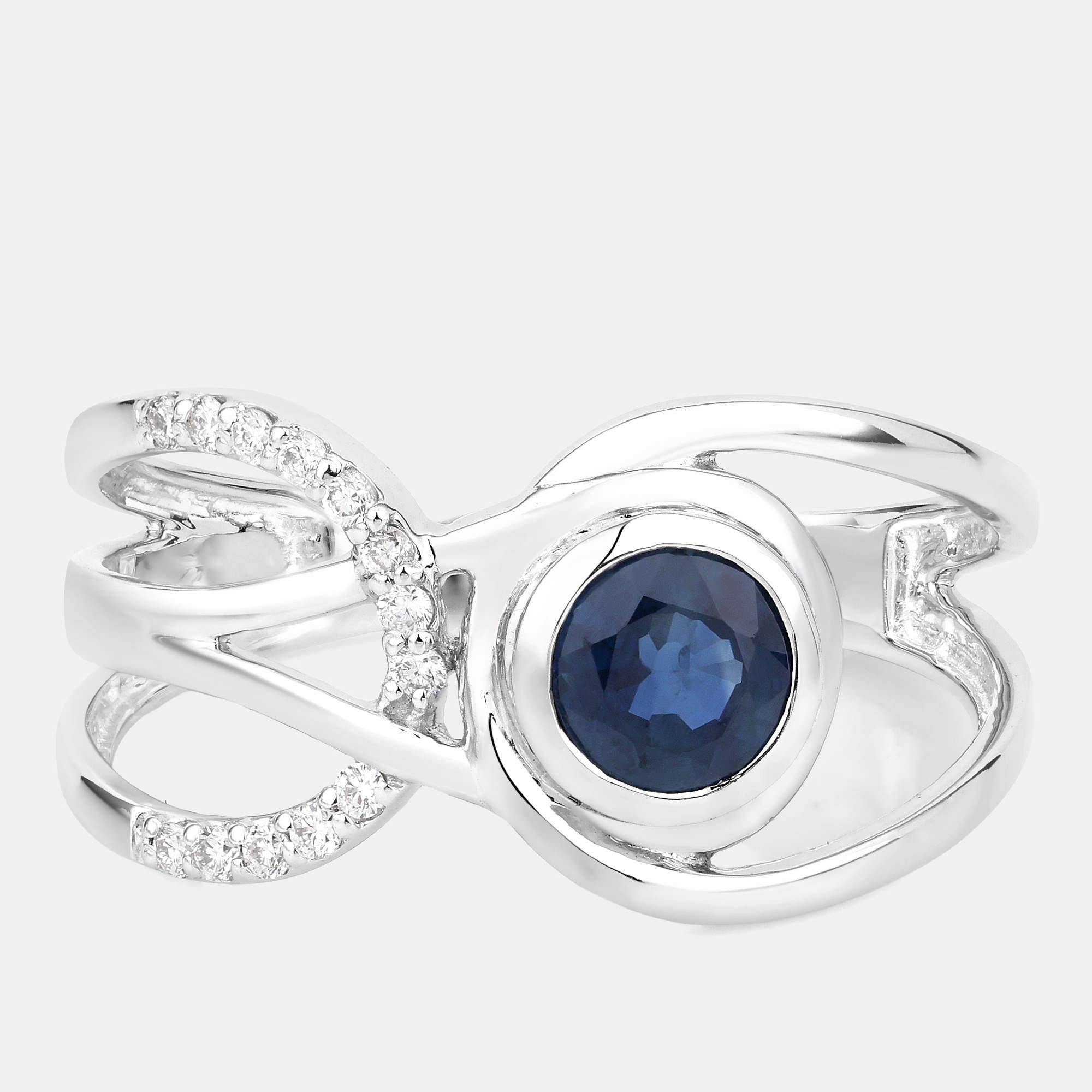 Pre Owned 0.68 cts Blue Sapphire and Diamond 14K White Gold Crossover Ring US Size 7