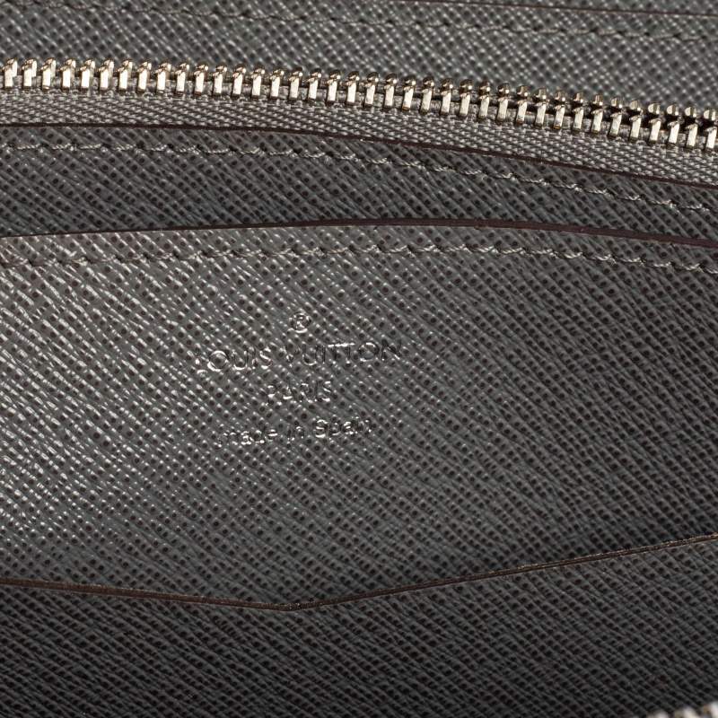 J.I.R Boutique - Louis Vuitton Taiga rainbow zippy wallet
