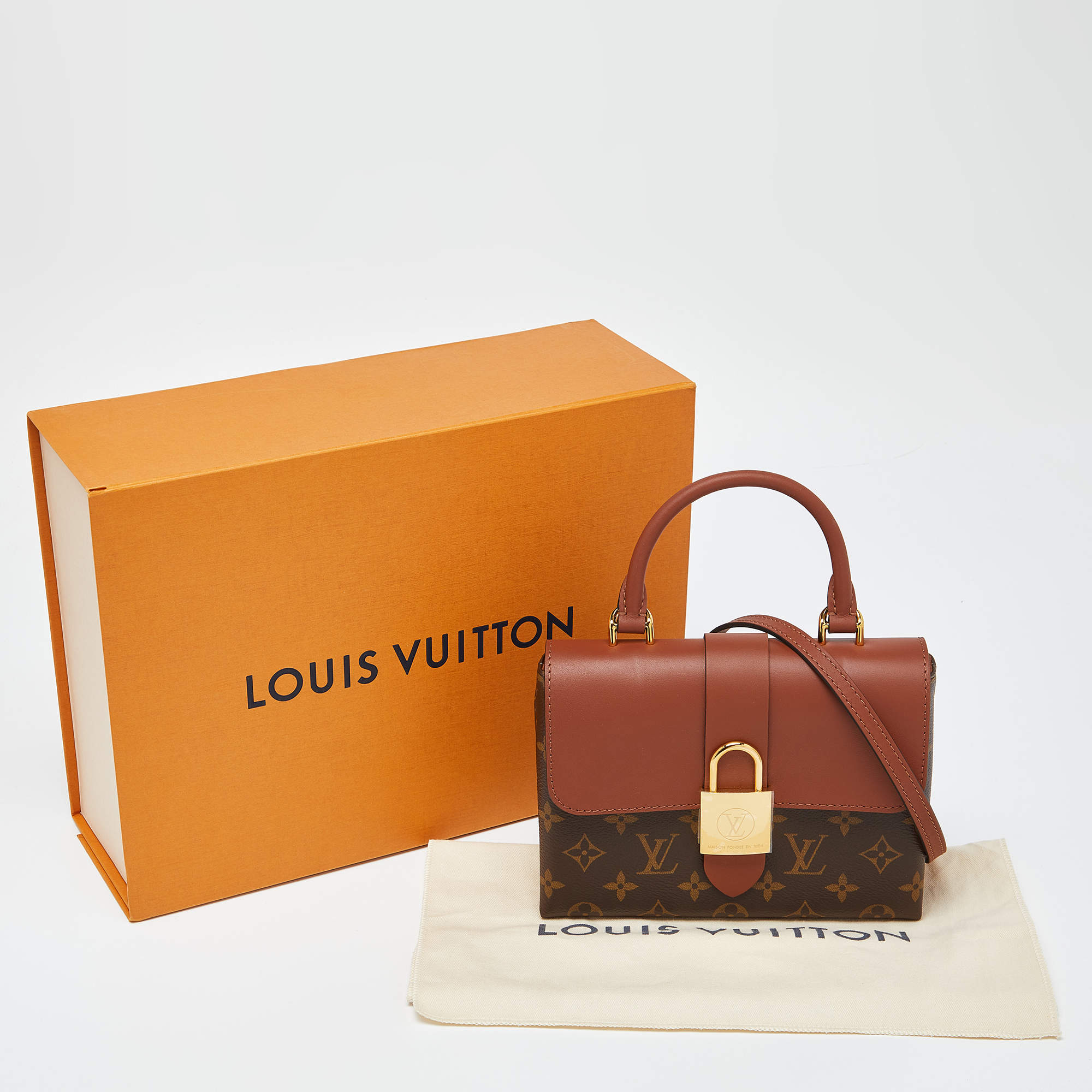 Louis Vuitton® Locky BB Caramel. Size  Handbag, Louis vuitton official,  Leather