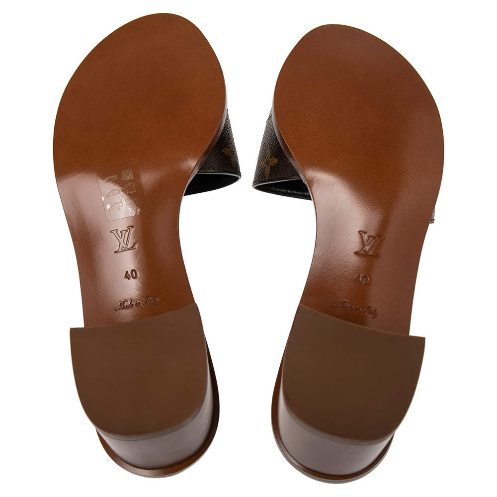 Lock it leather sandals Louis Vuitton Brown size 40 EU in Leather - 35318903