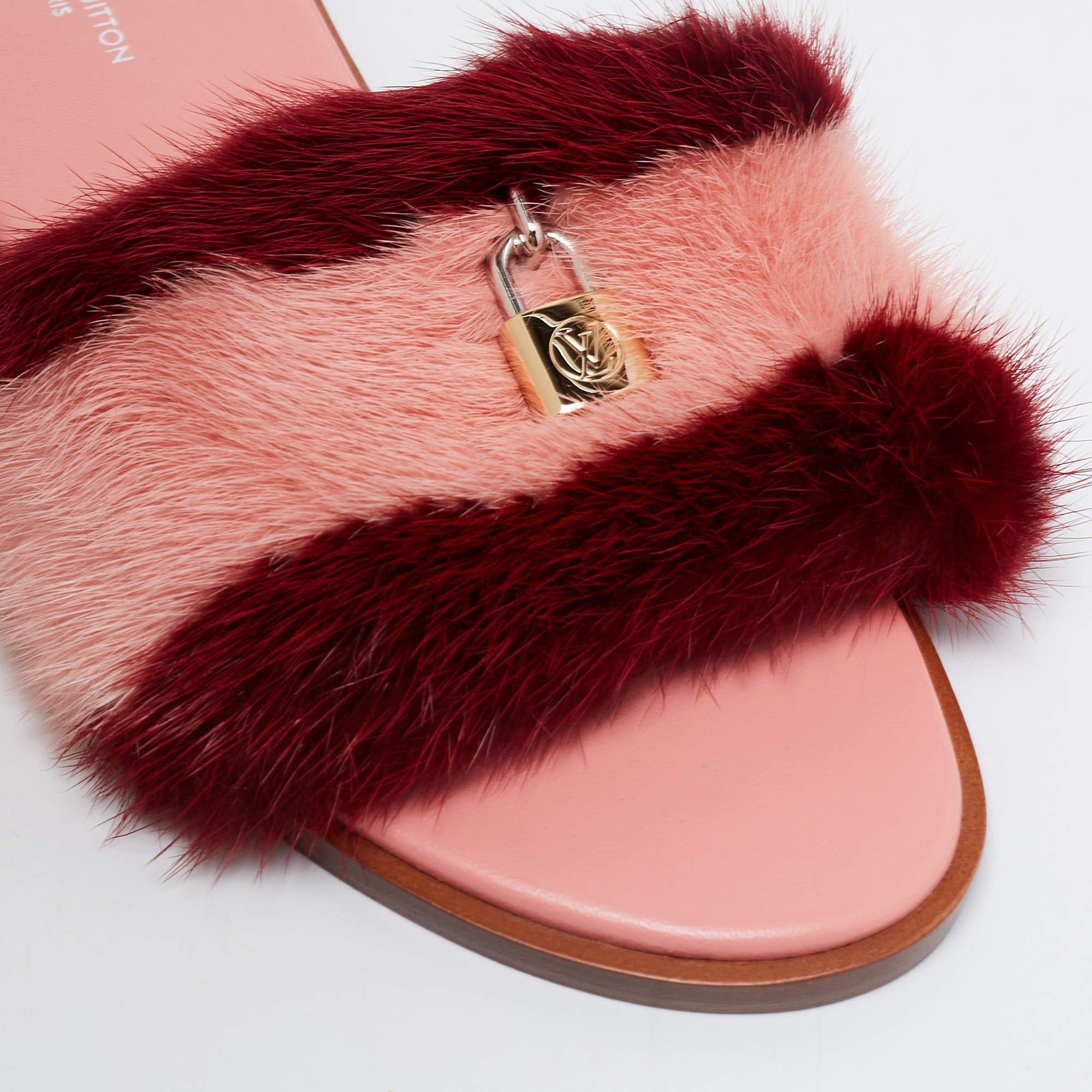 Louis Vuitton pink mink fur flip flops with gold - Depop