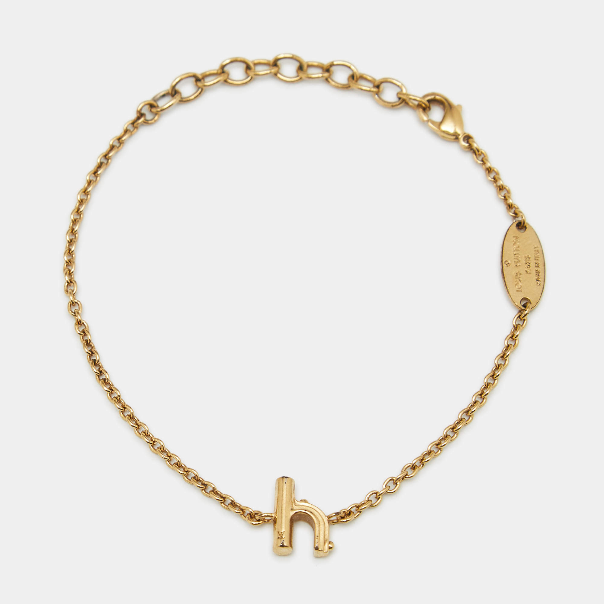 Pre Owned Louis Vuitton LV & Me Letter H Gold Tone Bracelet