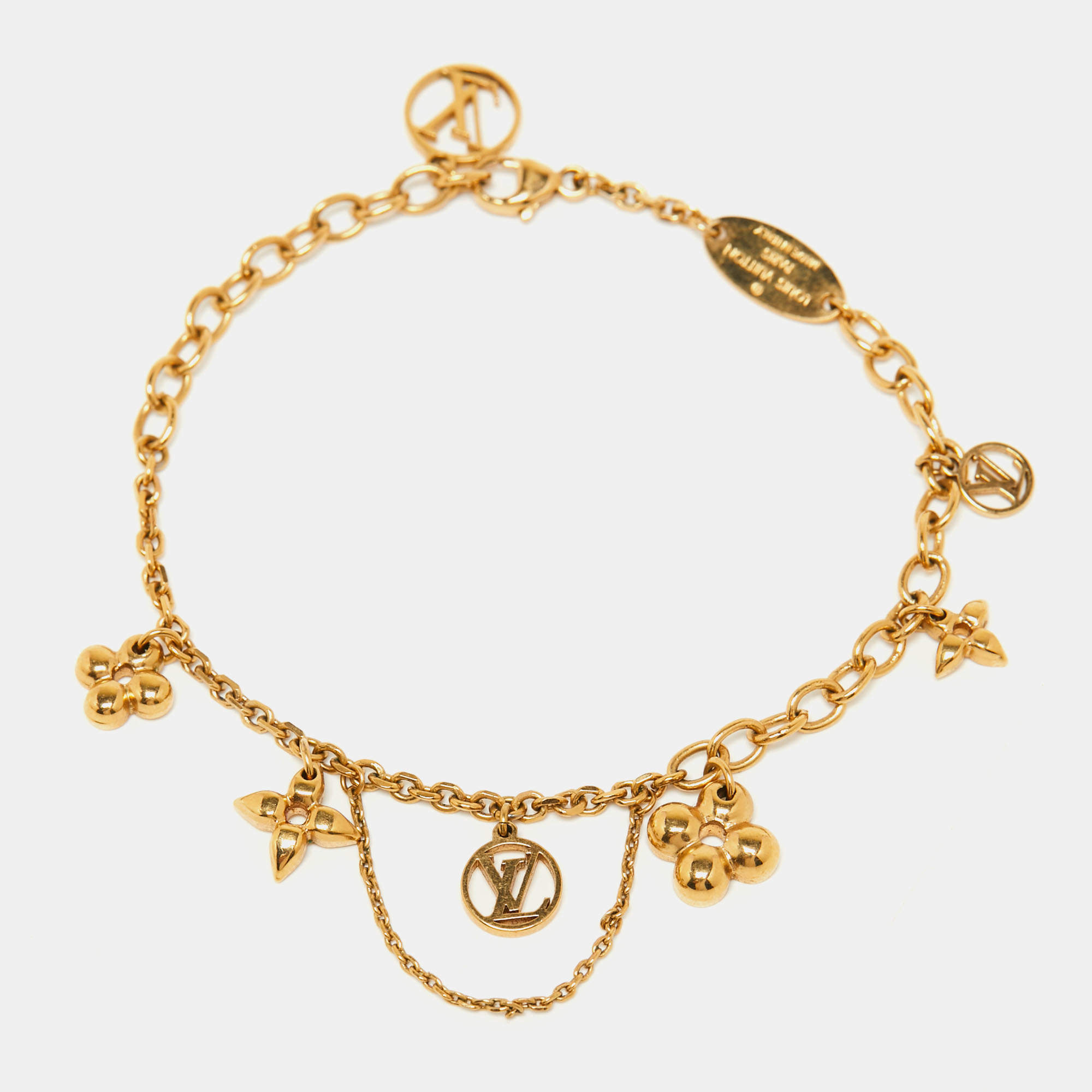 Louis Vuitton Blooming Supple Gold Tone Charm Bracelet Louis Vuitton ...