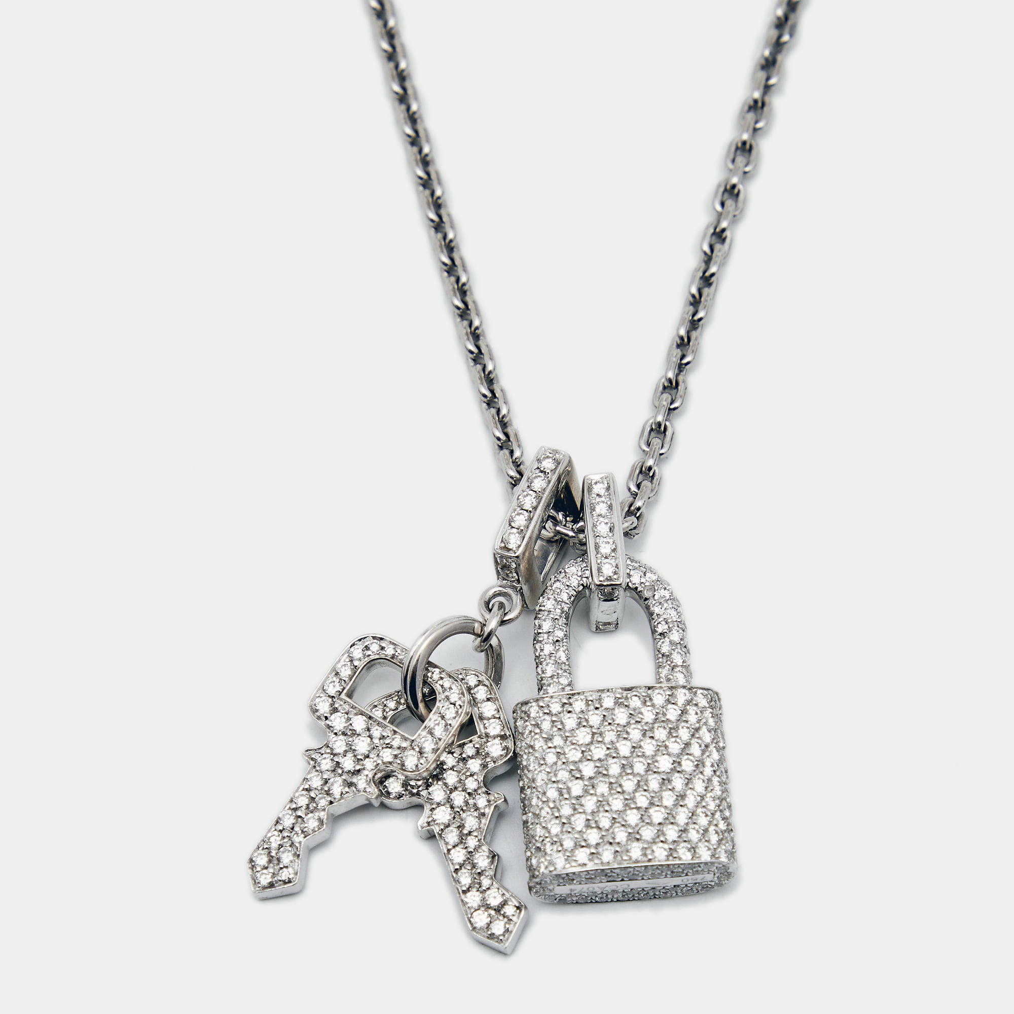 18 Karat White Gold and Diamond Lockit Pendant-Necklace by Louis Vuitton  (Co.) on artnet
