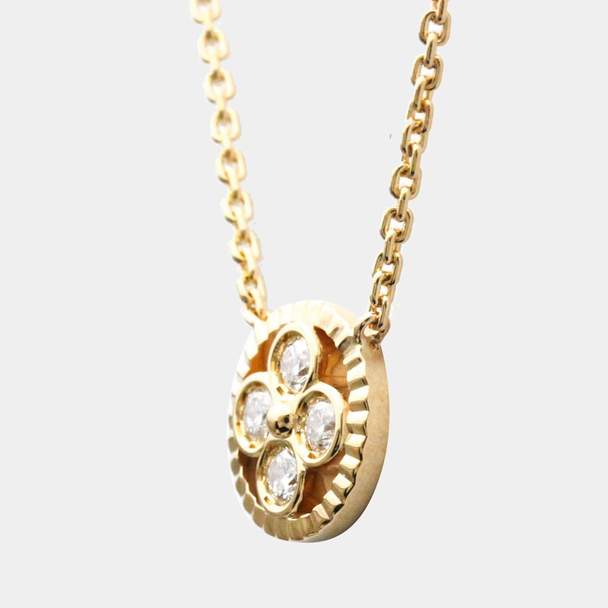 Vintage 18k gold Louis Vuitton pendant with diamonds