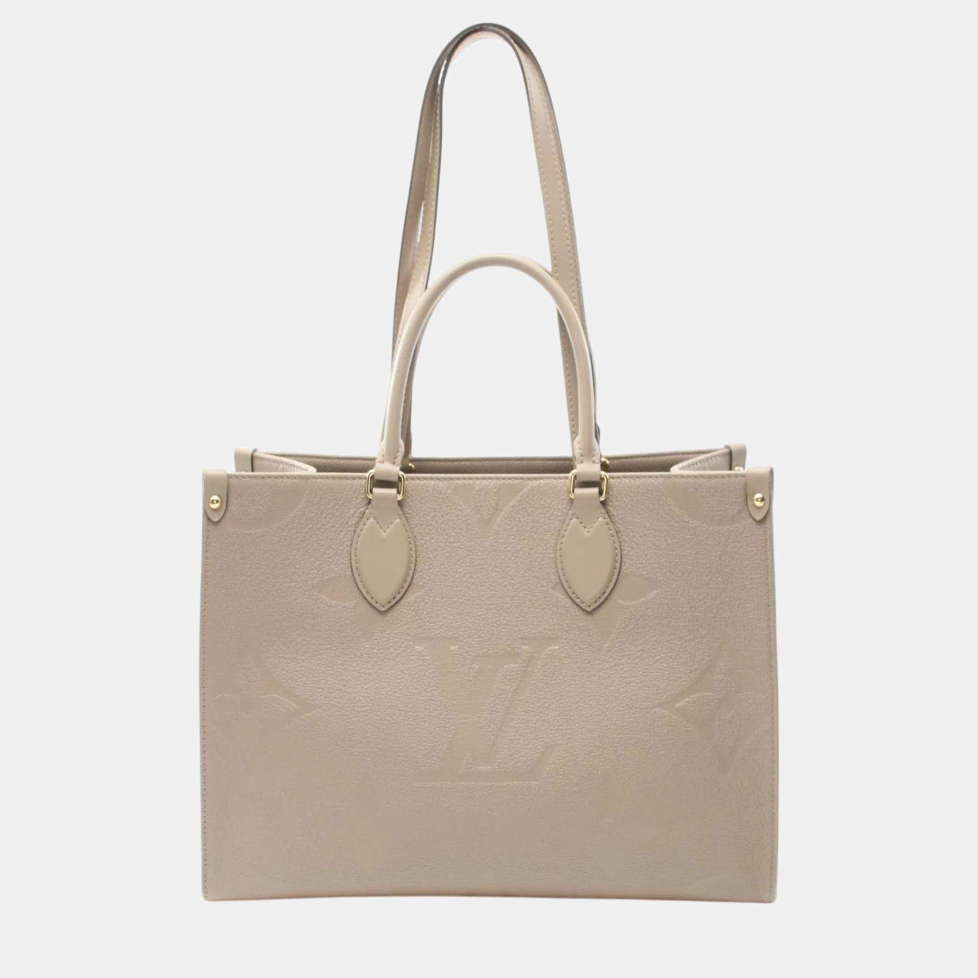 Louis Vuitton Leather Monogram Empreinte Beige On The Go Mm Tote Bag