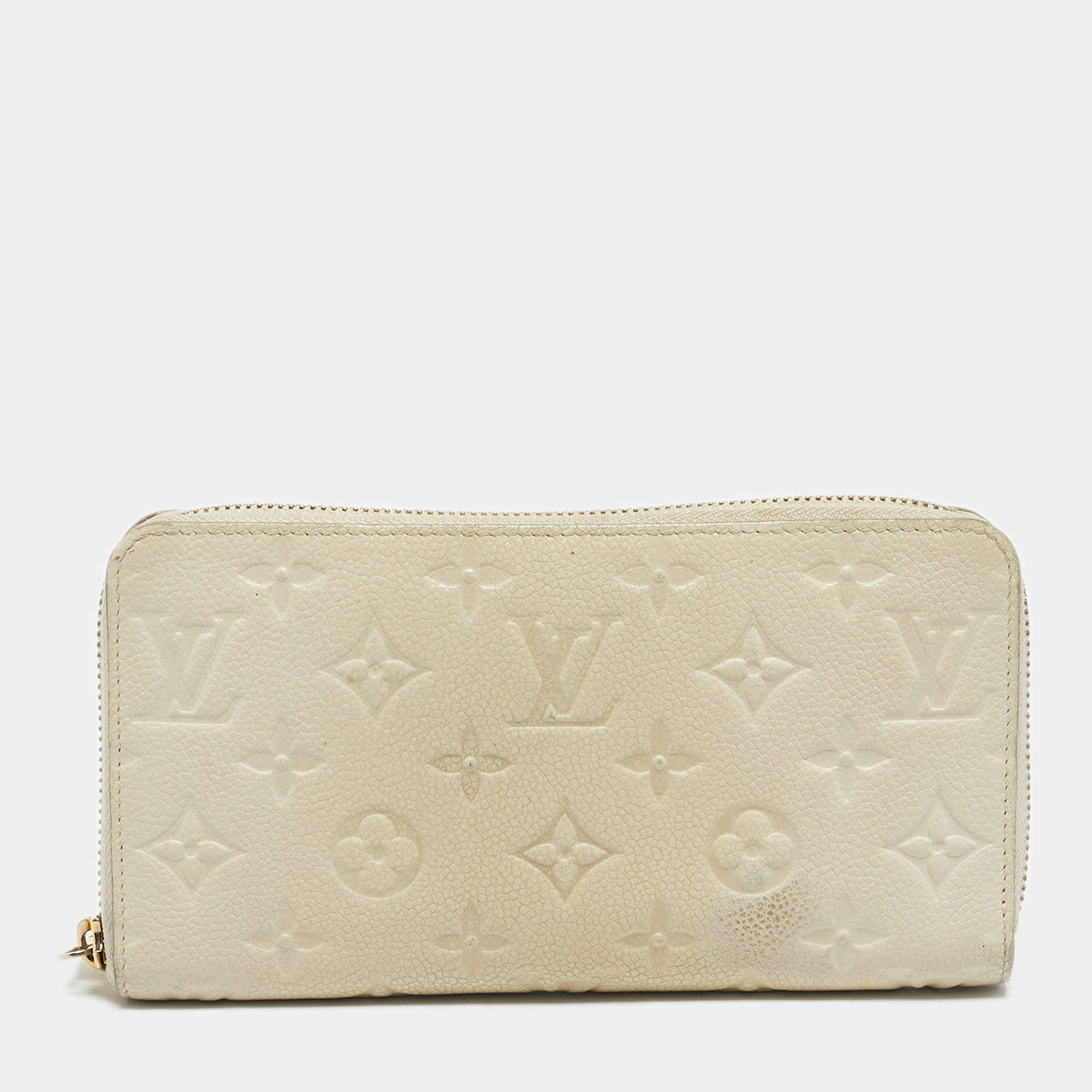 Pre Owned Louis Vuitton Off White Monogram Empreinte Leather Zippy Wallet