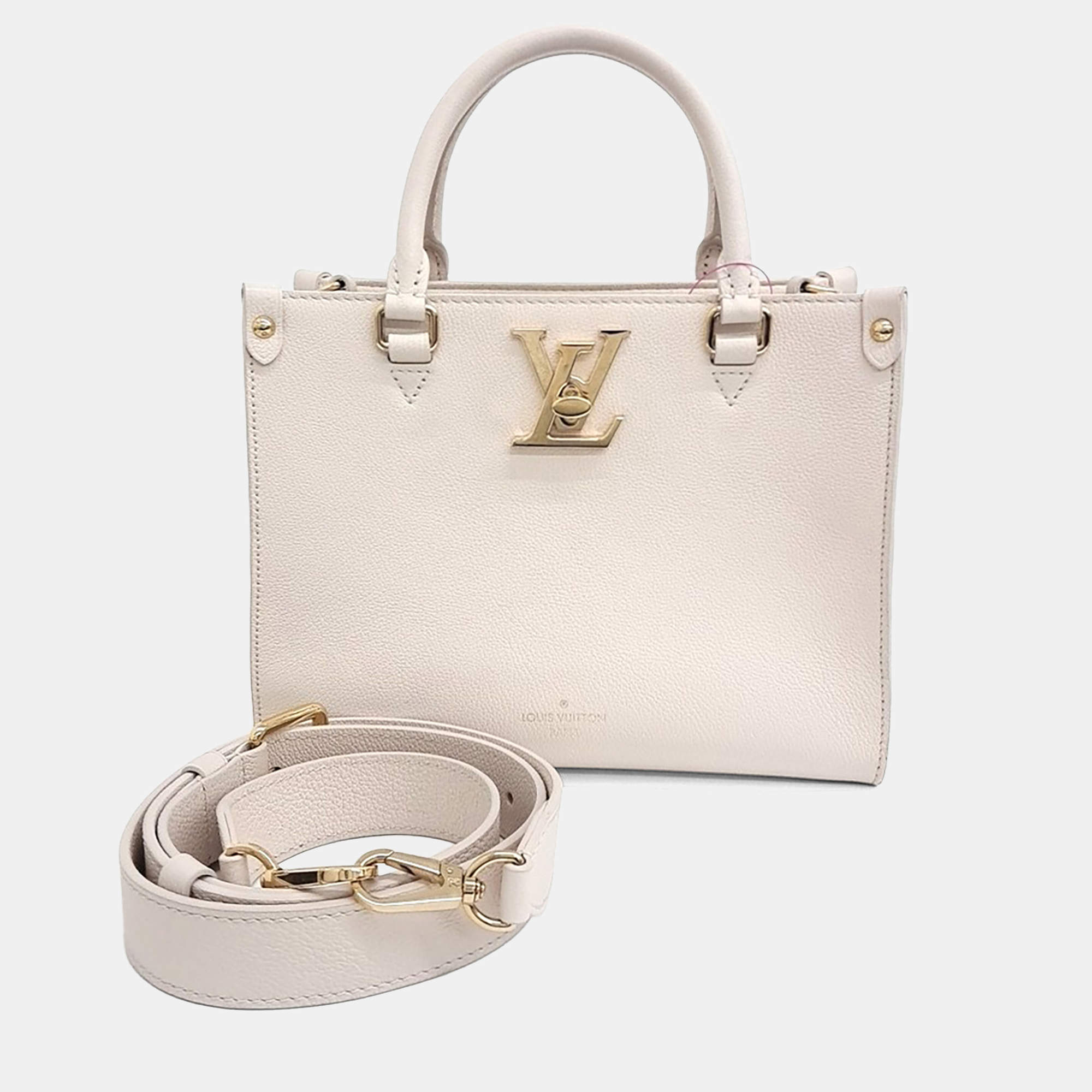 Pre Owned Louis Vuitton Cream Leather Lock & Go