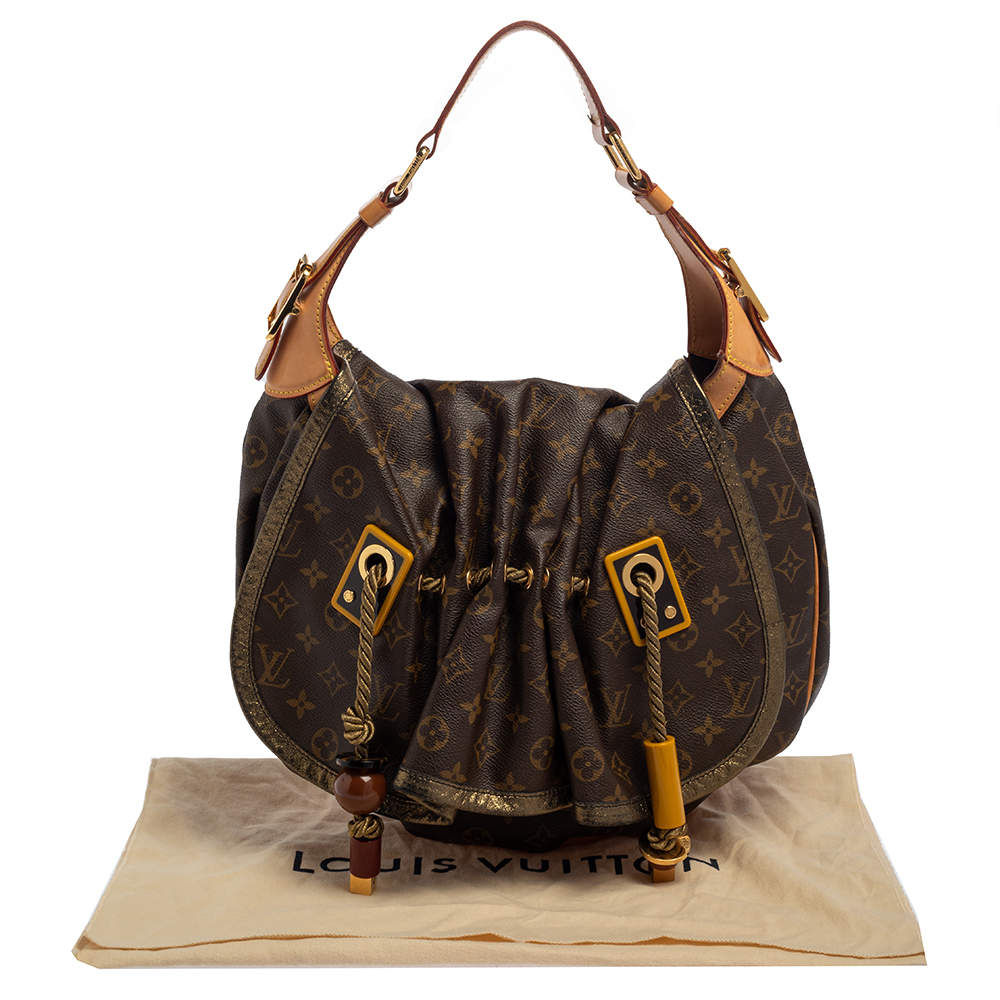 Kalahari cloth handbag Louis Vuitton Brown in Cloth - 18946203