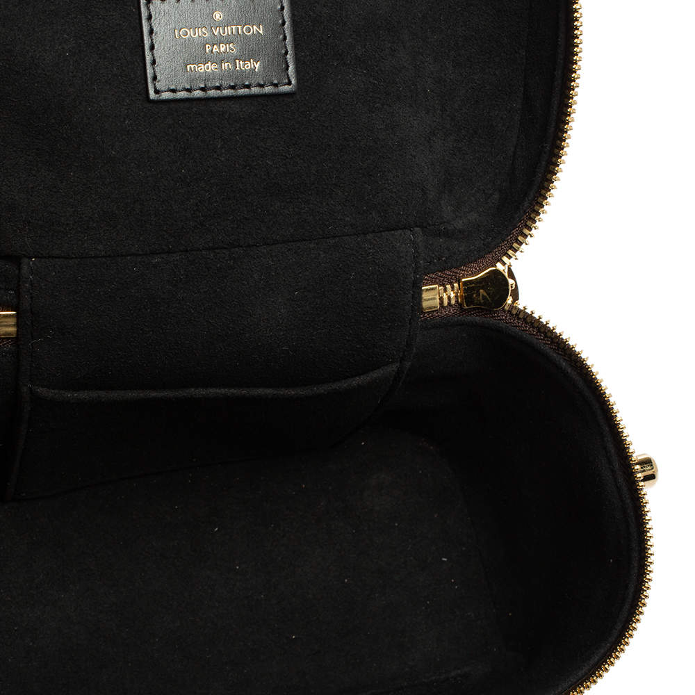 Vanity cloth handbag Louis Vuitton Brown in Cloth - 24984197