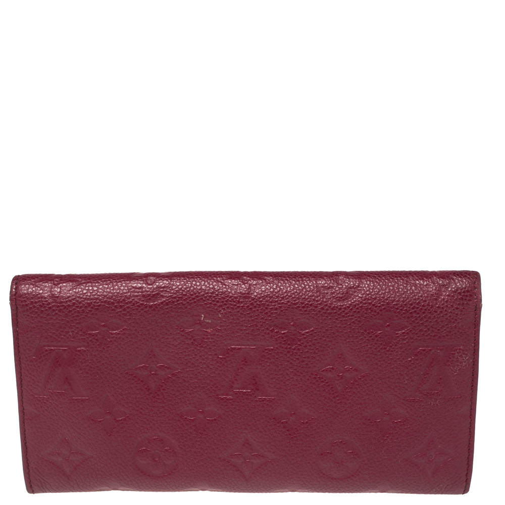 Authentic Louis Vuitton Aurore Monogram Empreinte Leather Curieuse