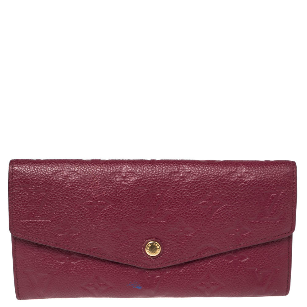 Pre Owned محفظة لوي فيتون كوريوز جلد مطبوع مونوغرامي أحمر داكن