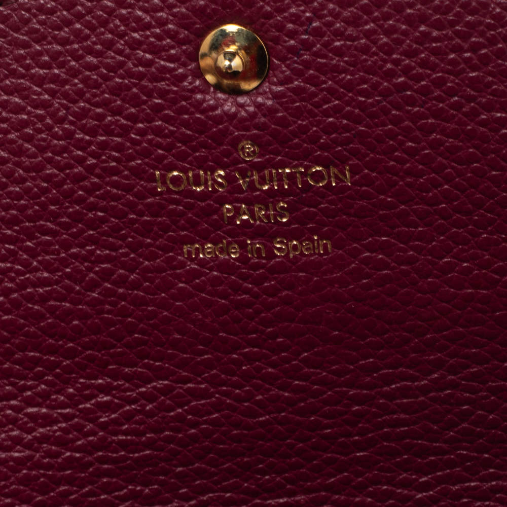 Authentic Louis Vuitton Aurore Monogram Empreinte Leather Curieuse