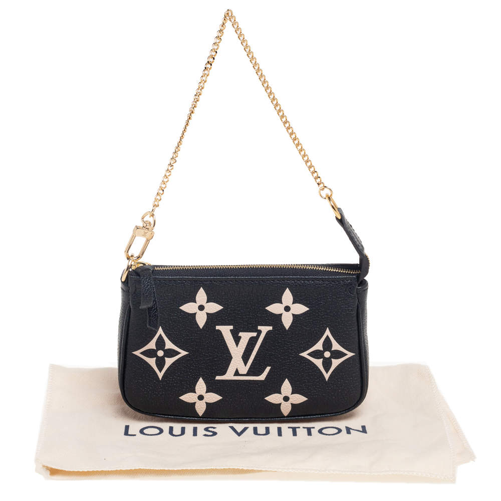 Louis Vuitton Mini Pochette Accessoires Black in Lotus Cotton with