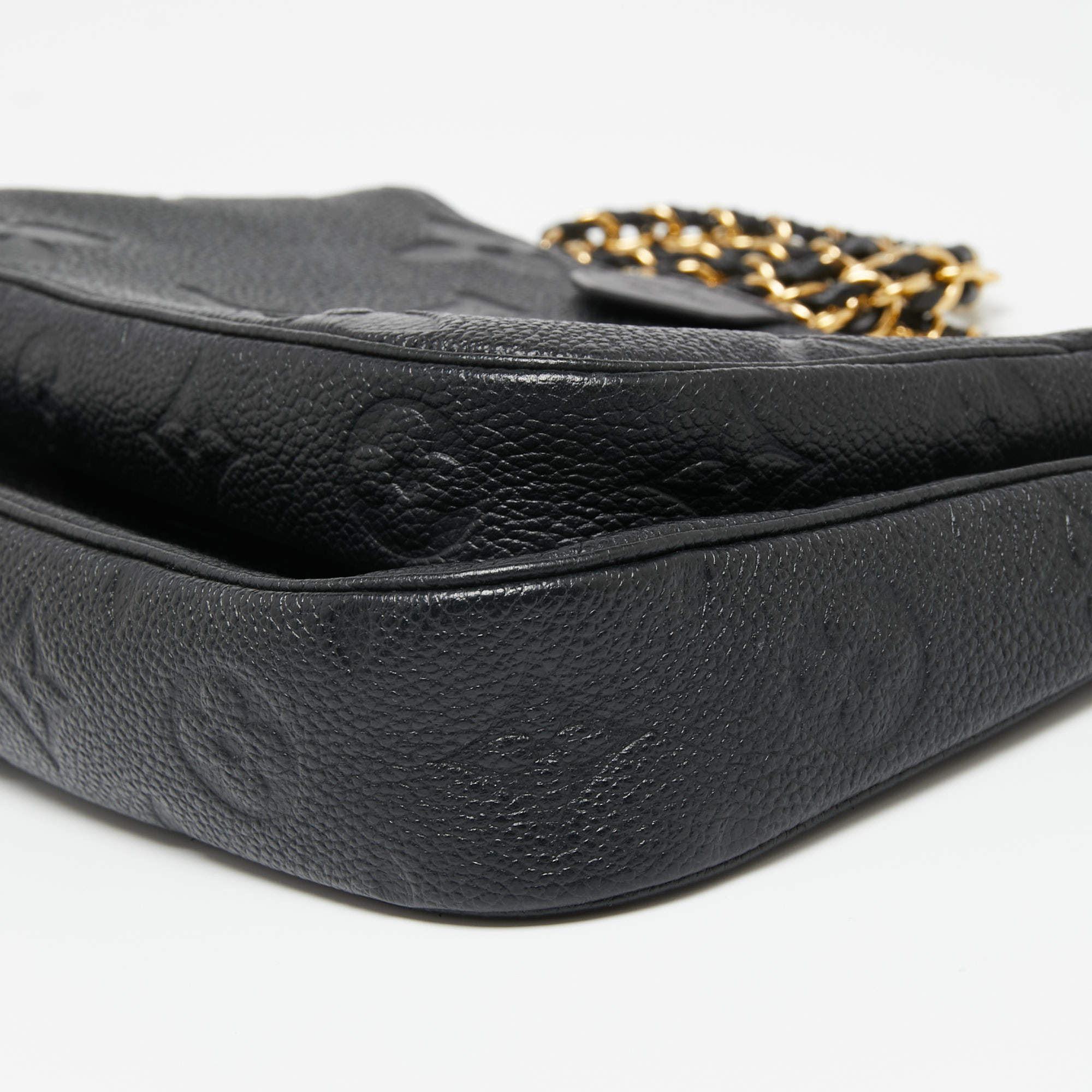 Pochette accessoire leather clutch bag Louis Vuitton Black in Leather -  35653095