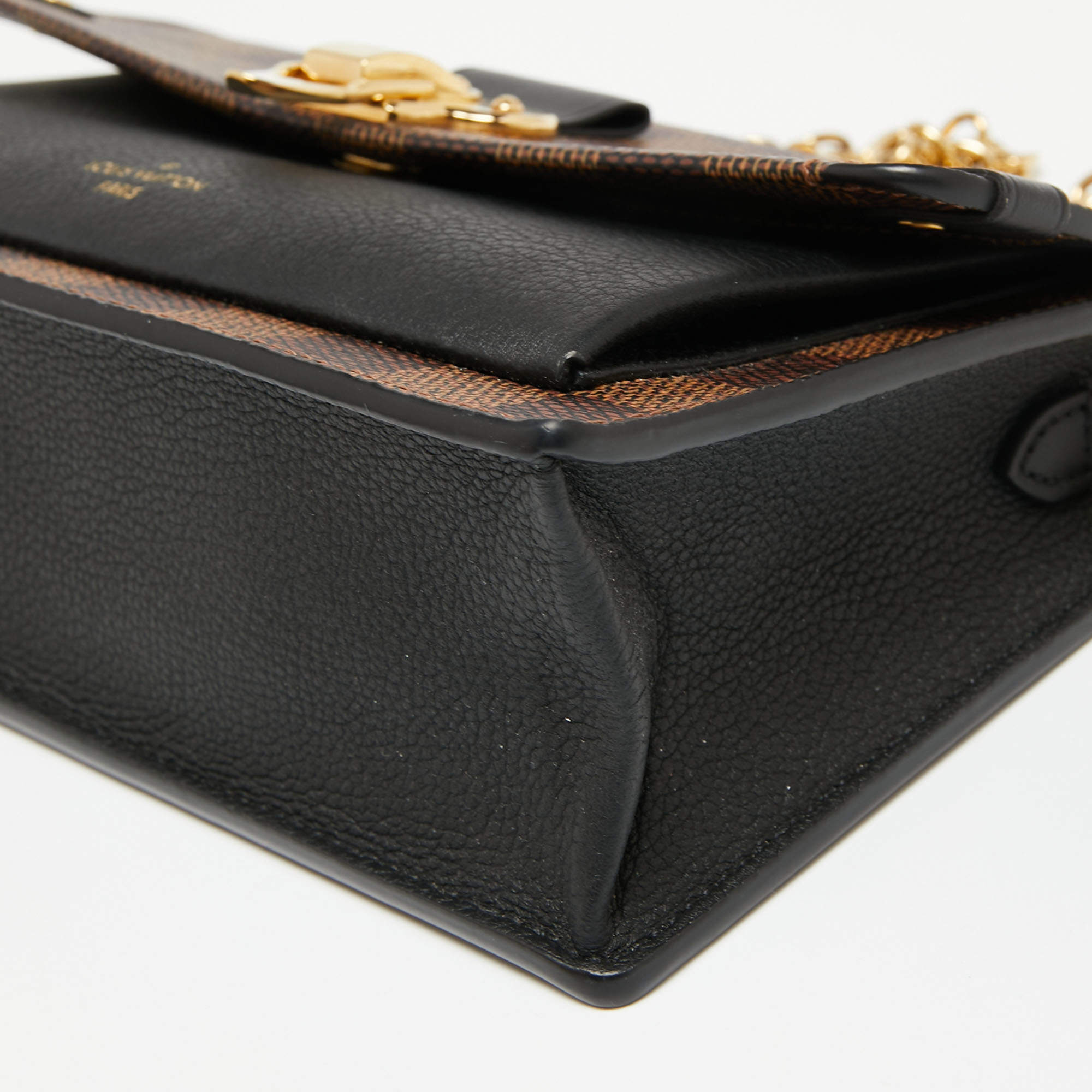 Louis Vuitton Damier Ebene Vavin Wallet on Chain in brown coated/waterproof  canvas Cloth ref.368571 - Joli Closet