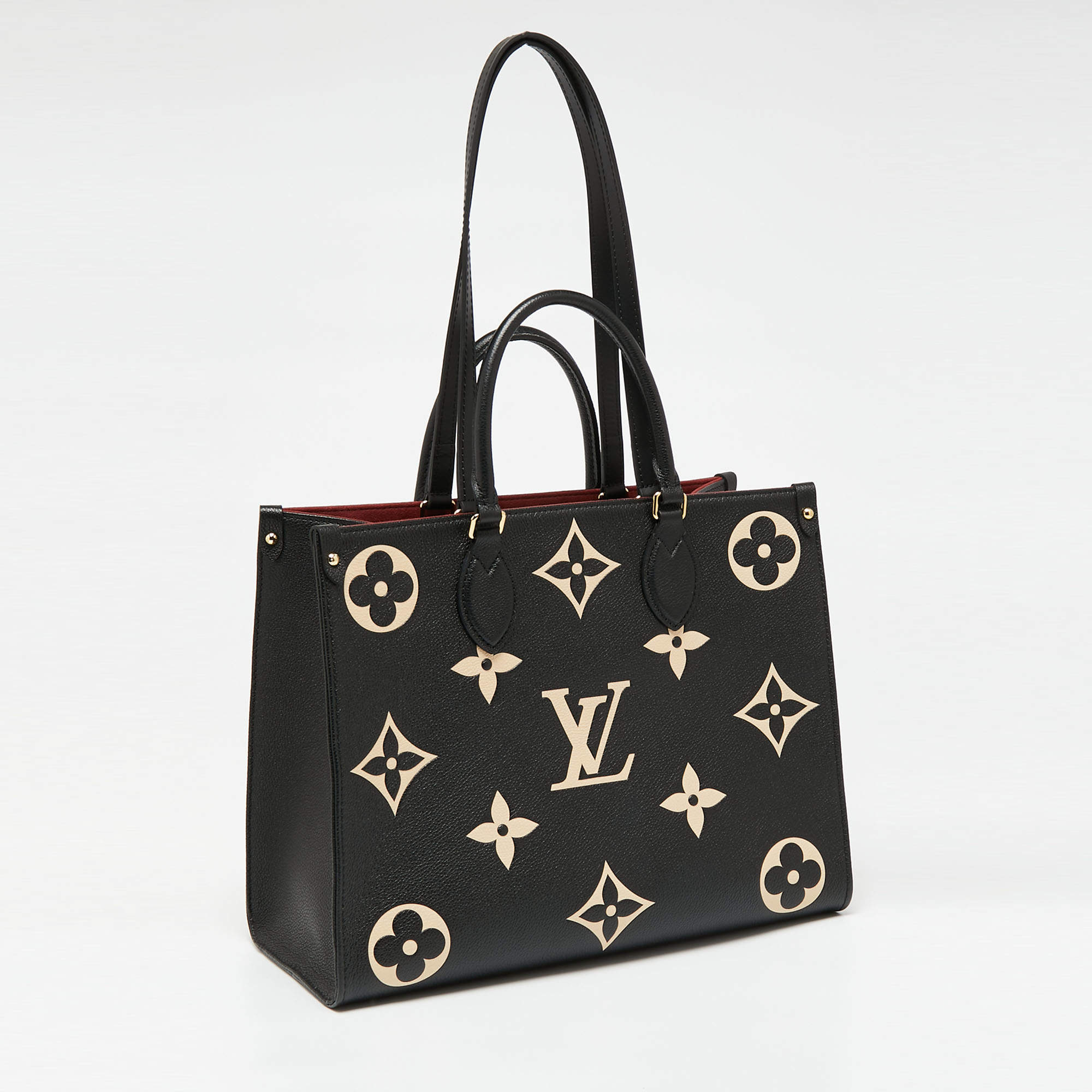 Louis Vuitton Bicolor Monogram Empreinte Leather Giant Onthego MM Bag at  1stDibs