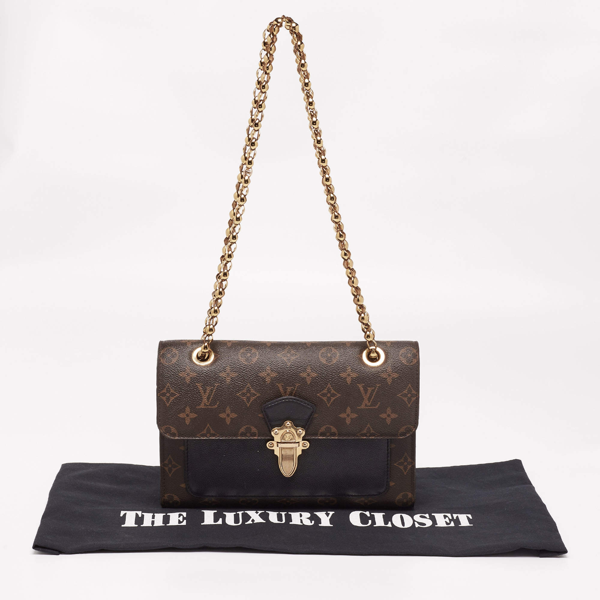 Louis Vuitton Monogram Canvas and Black Leather Victoire Bag