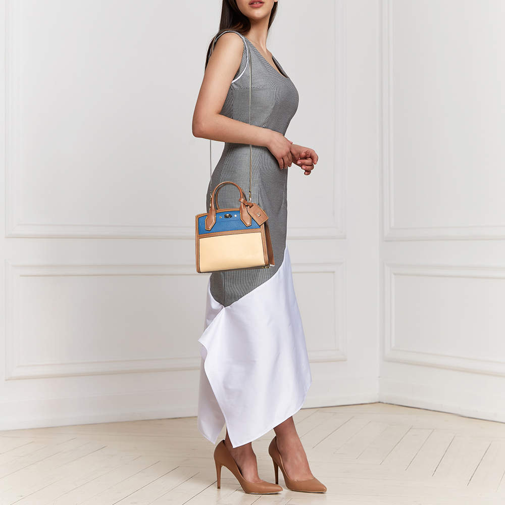 Louis Vuitton Pink/Cream Taurillon Leather and Python City Steamer Mini Bag  Louis Vuitton | The Luxury Closet