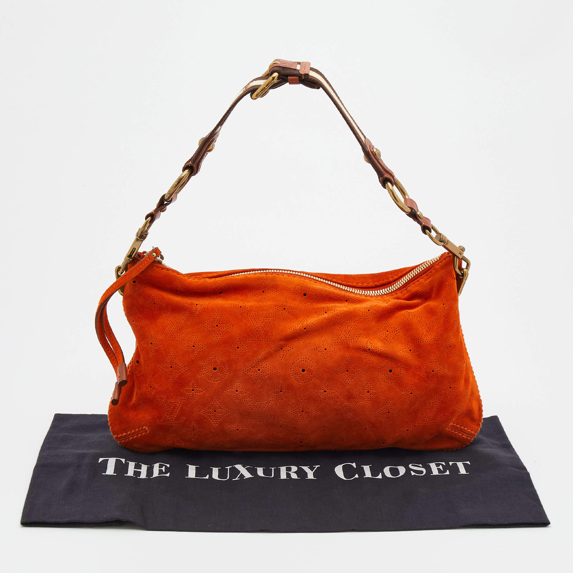 Louis Vuitton Brown Mahina Onatah GM Dark brown Leather Pony-style calfskin  ref.419025 - Joli Closet