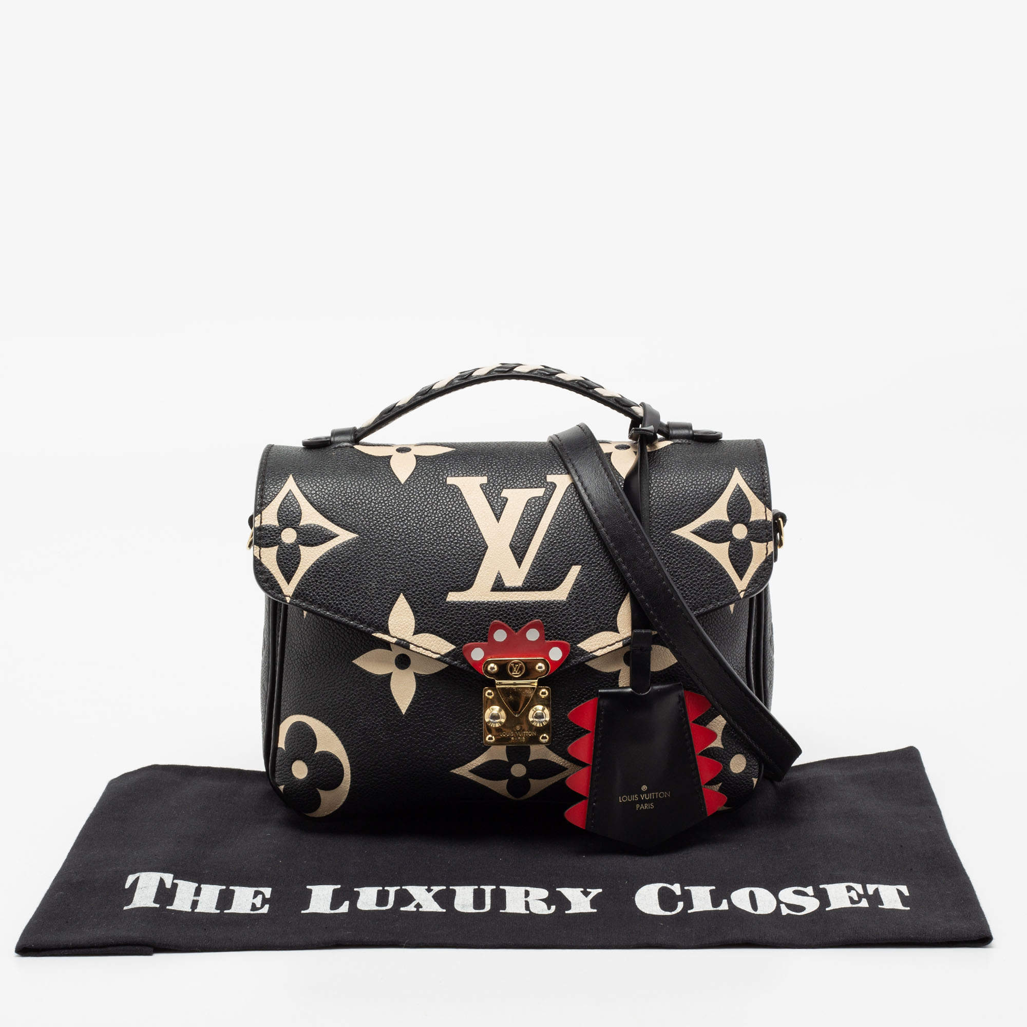 Louis Vuitton Limited Edition Giant Monogram Empreinte Crafty Sarah Wa –  LuxeDH