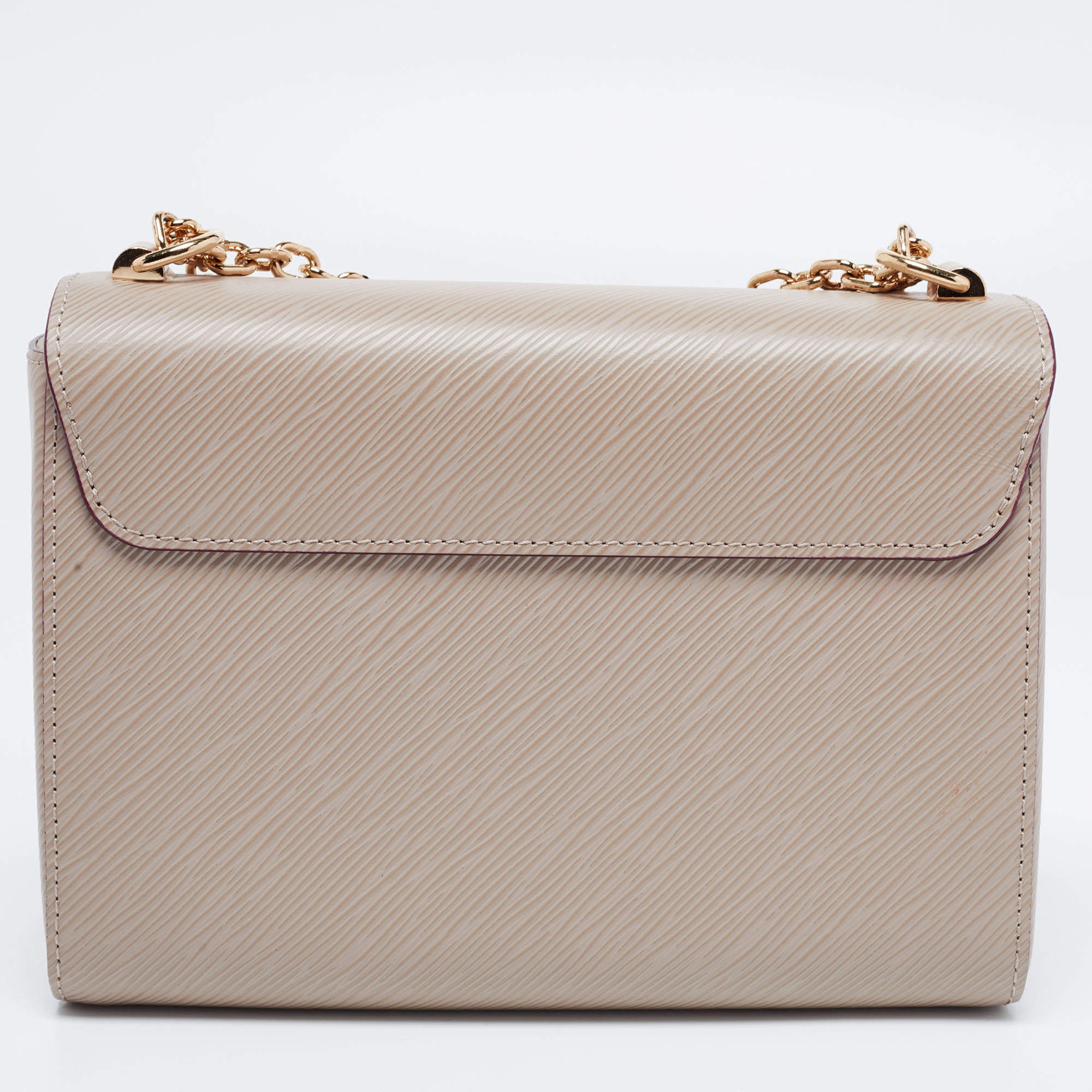 Twist leather handbag Louis Vuitton Beige in Leather - 35767927