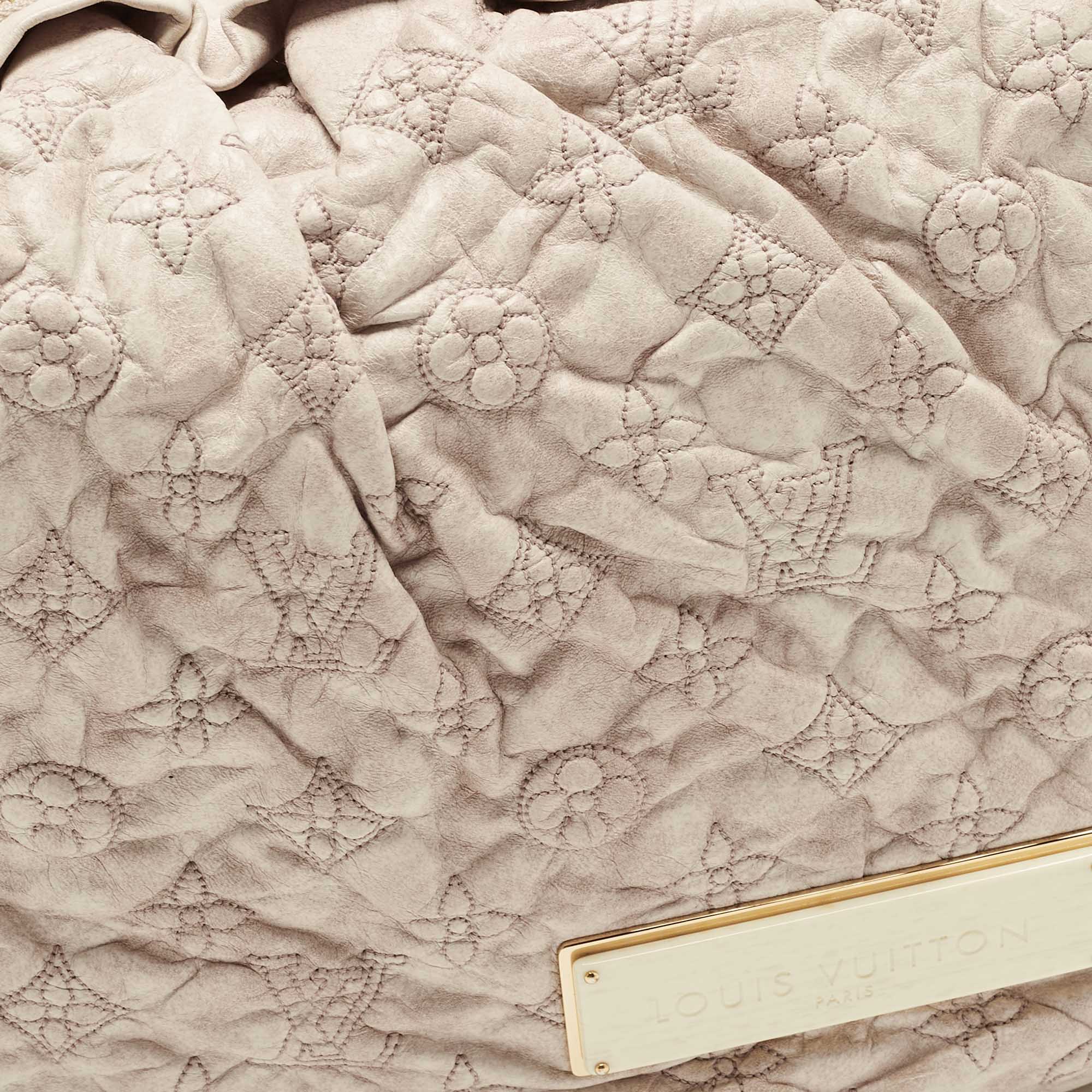 Unit K Sandymount - Louis Vuitton. Limited Edition Olympe Nimbus. Ecru  monogrammed leather. Pristine condition.