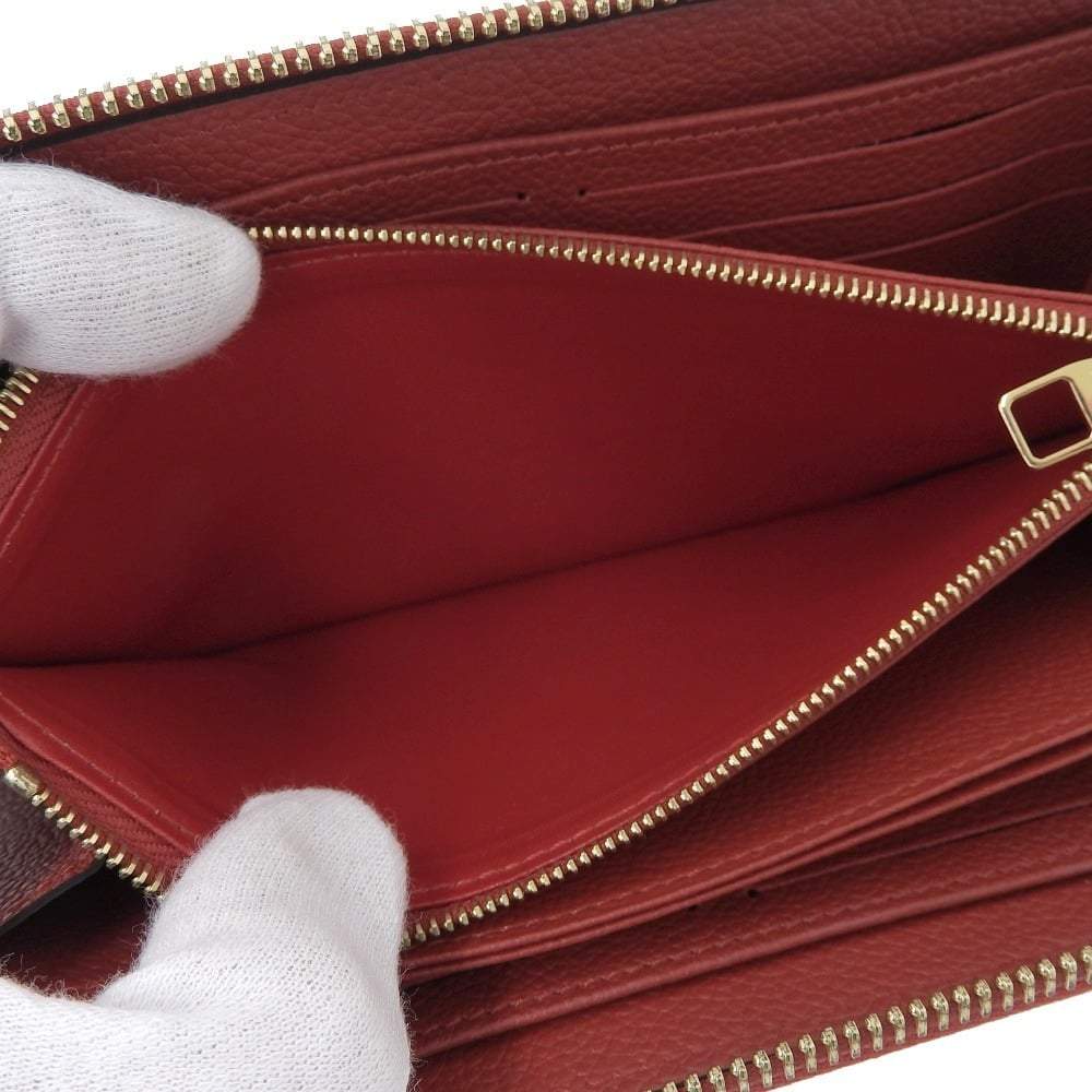 Zippy cloth wallet Louis Vuitton Burgundy in Cloth - 24017654