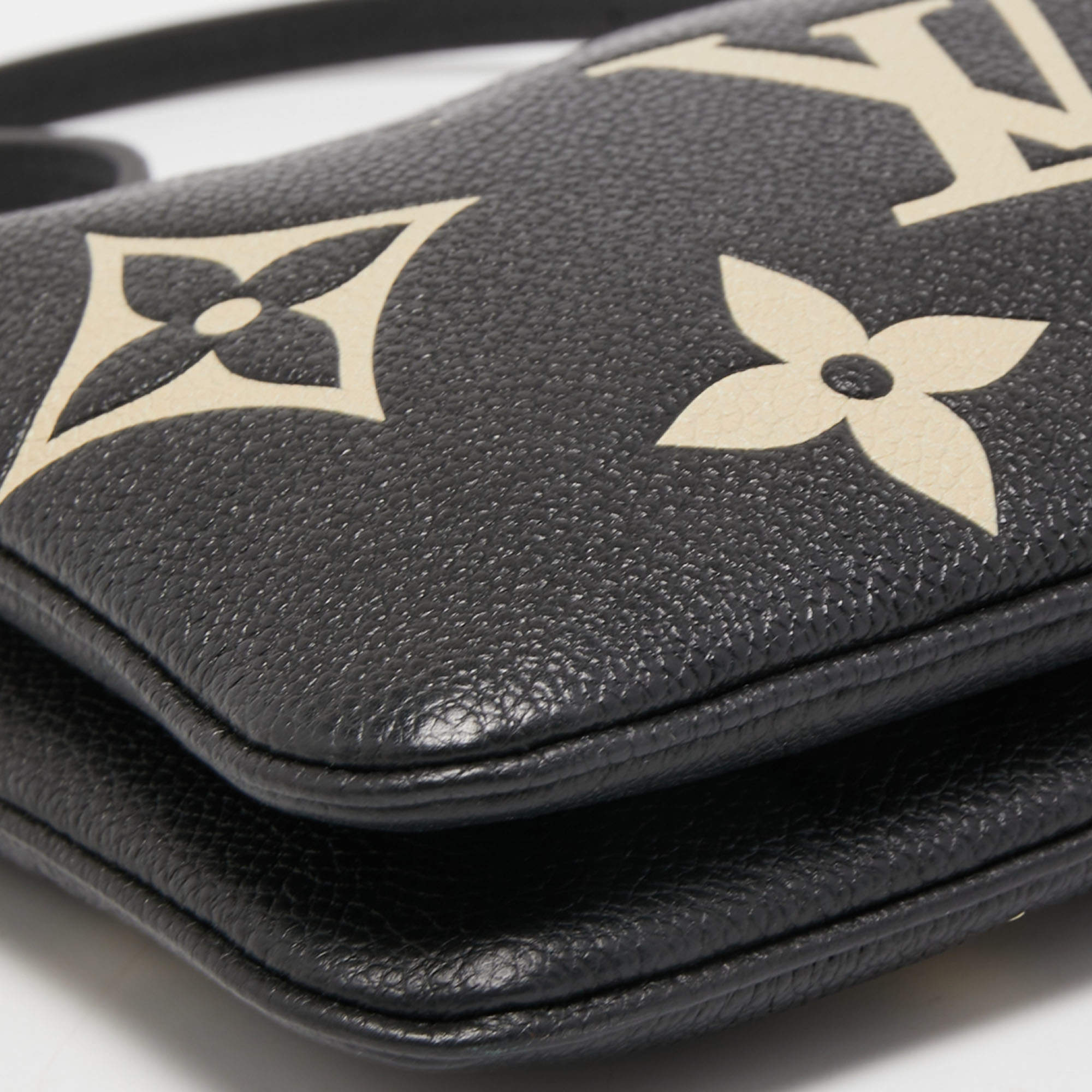 Louis Vuitton Double Zip Pochette Monogram Empreinte Leather with Gold –  EliteLaza
