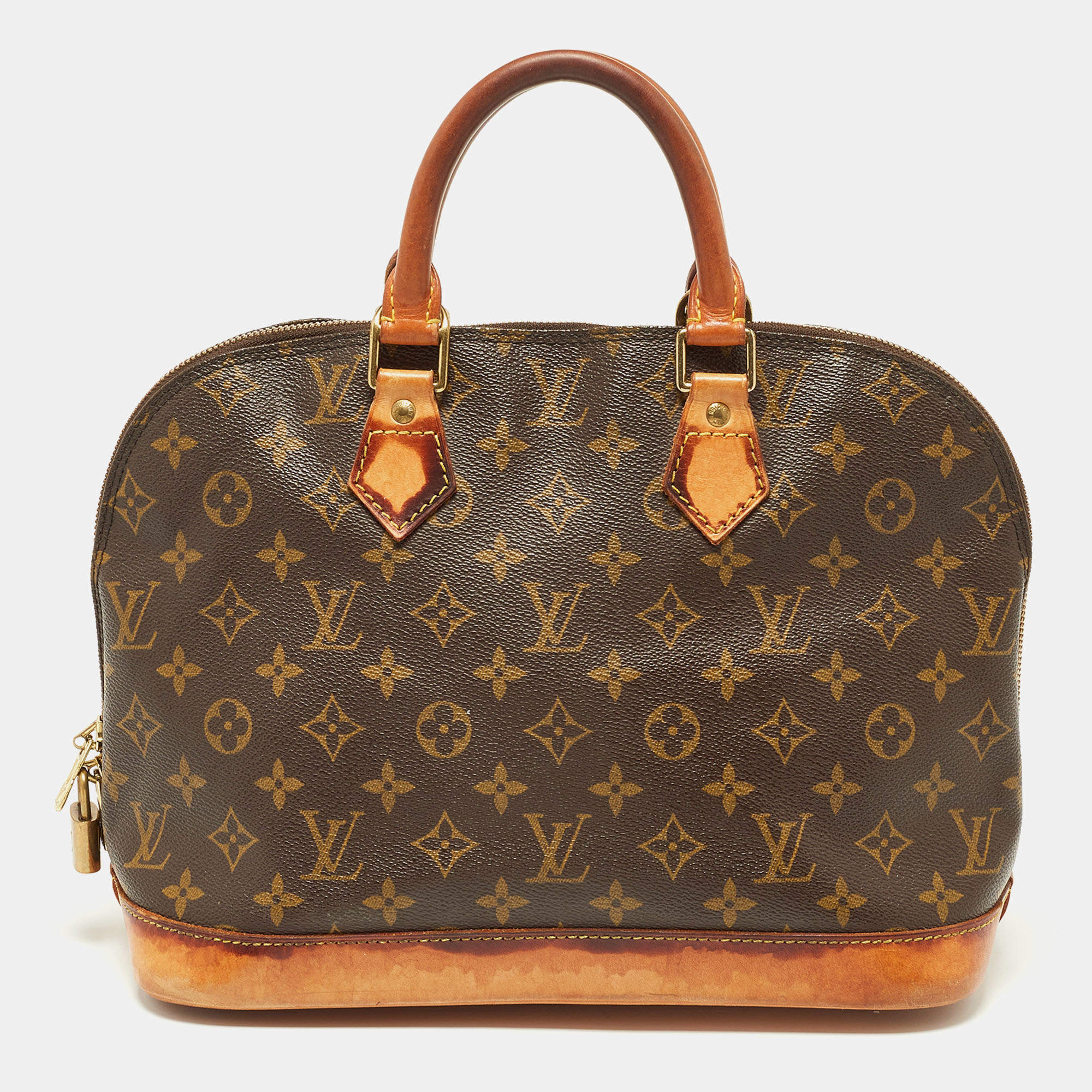 Louis Vuitton Monogram Studded Alma Bag