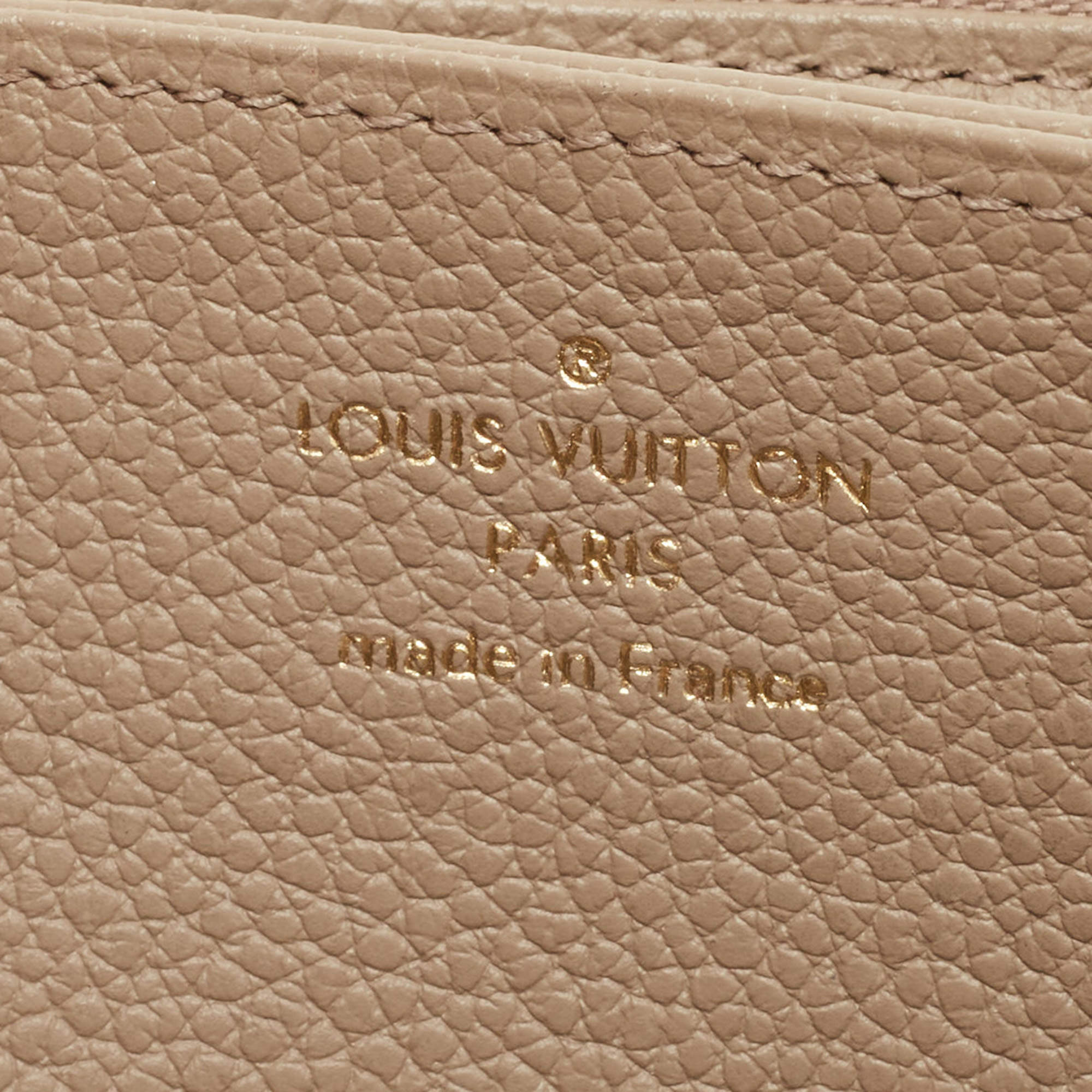 Louis Vuitton Tourterelle/Creme Monogram Empreinte Leather Zippy Wallet  Louis Vuitton