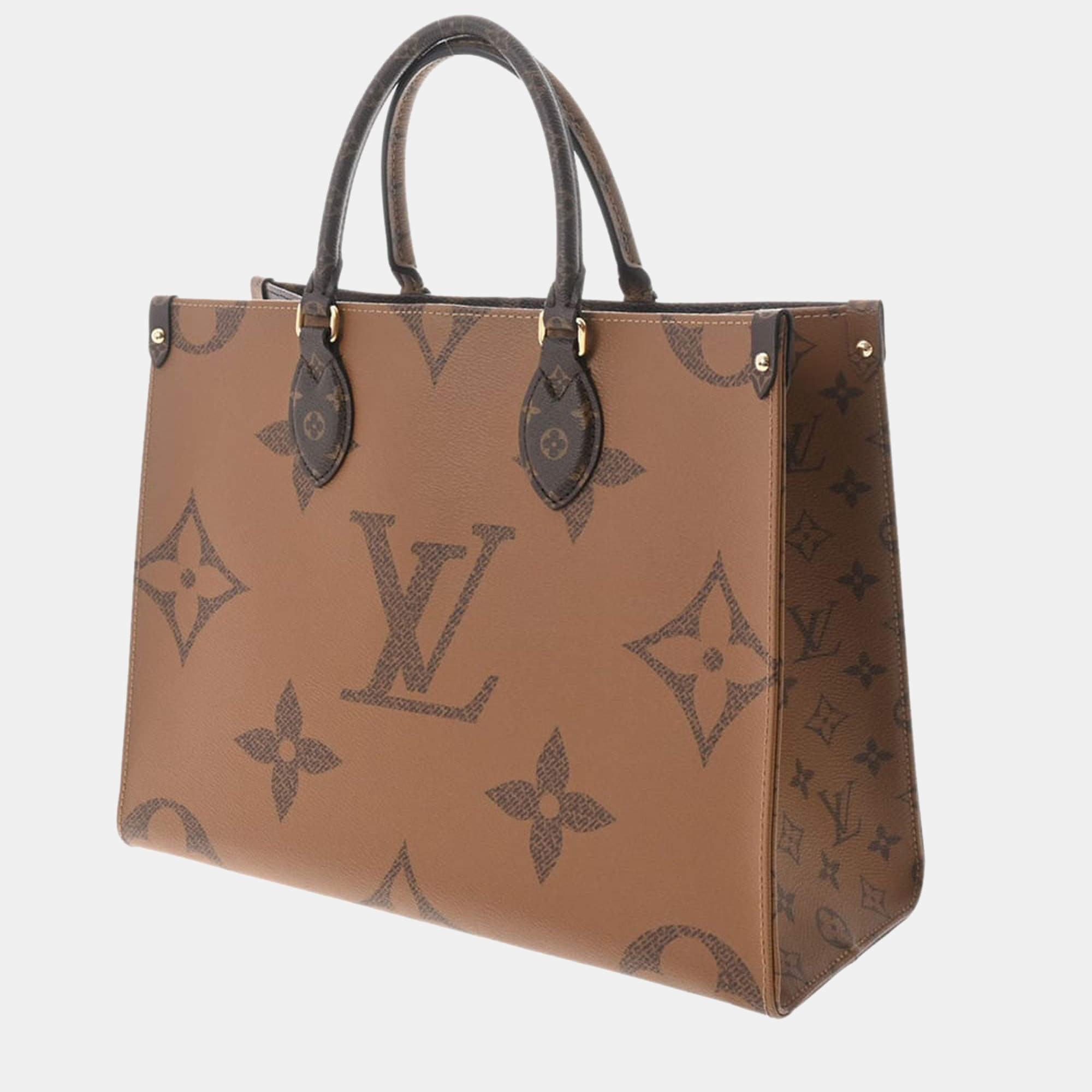 Used louis vuitton on the go mm tote