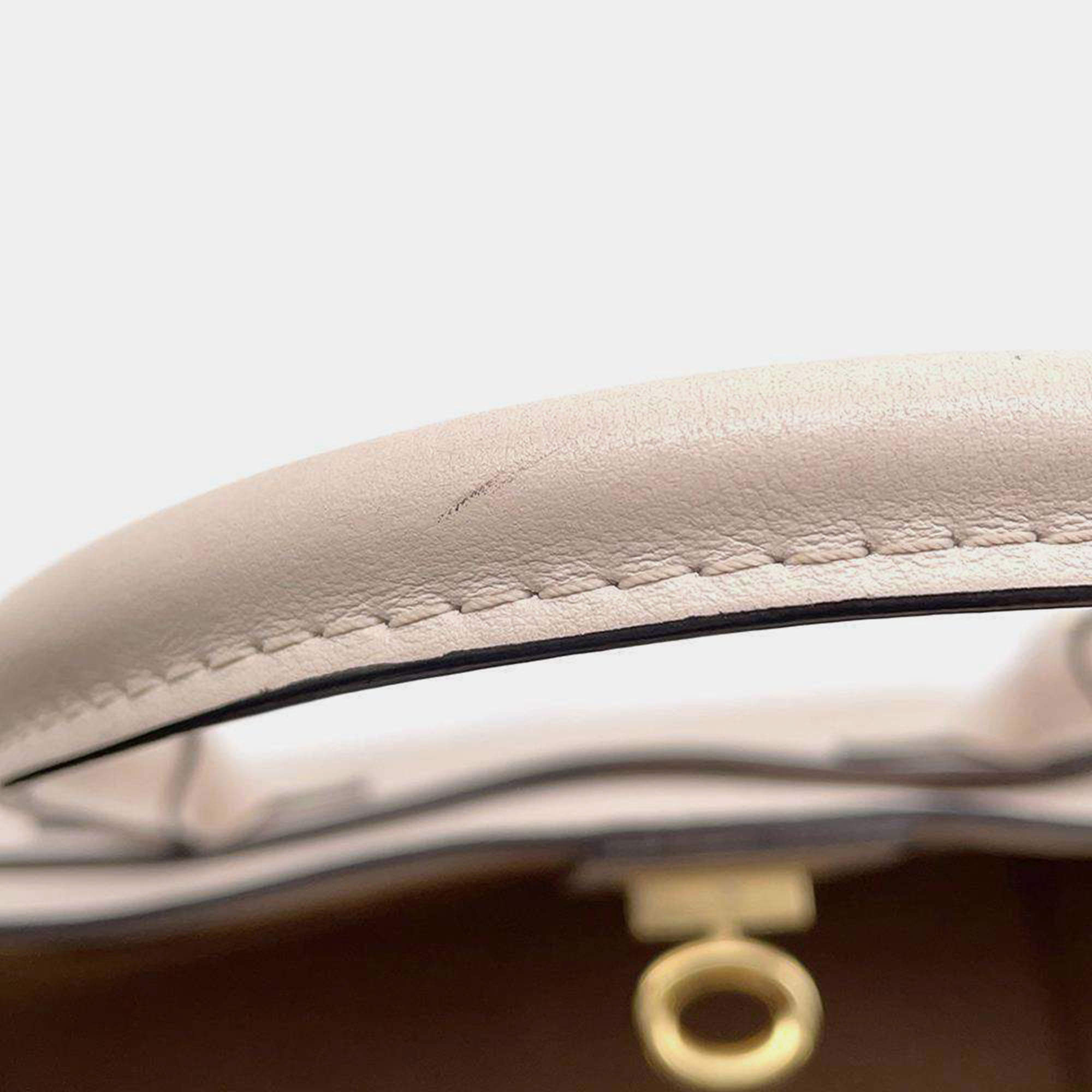 Mahina leather handbag Louis Vuitton Beige in Leather - 26163941