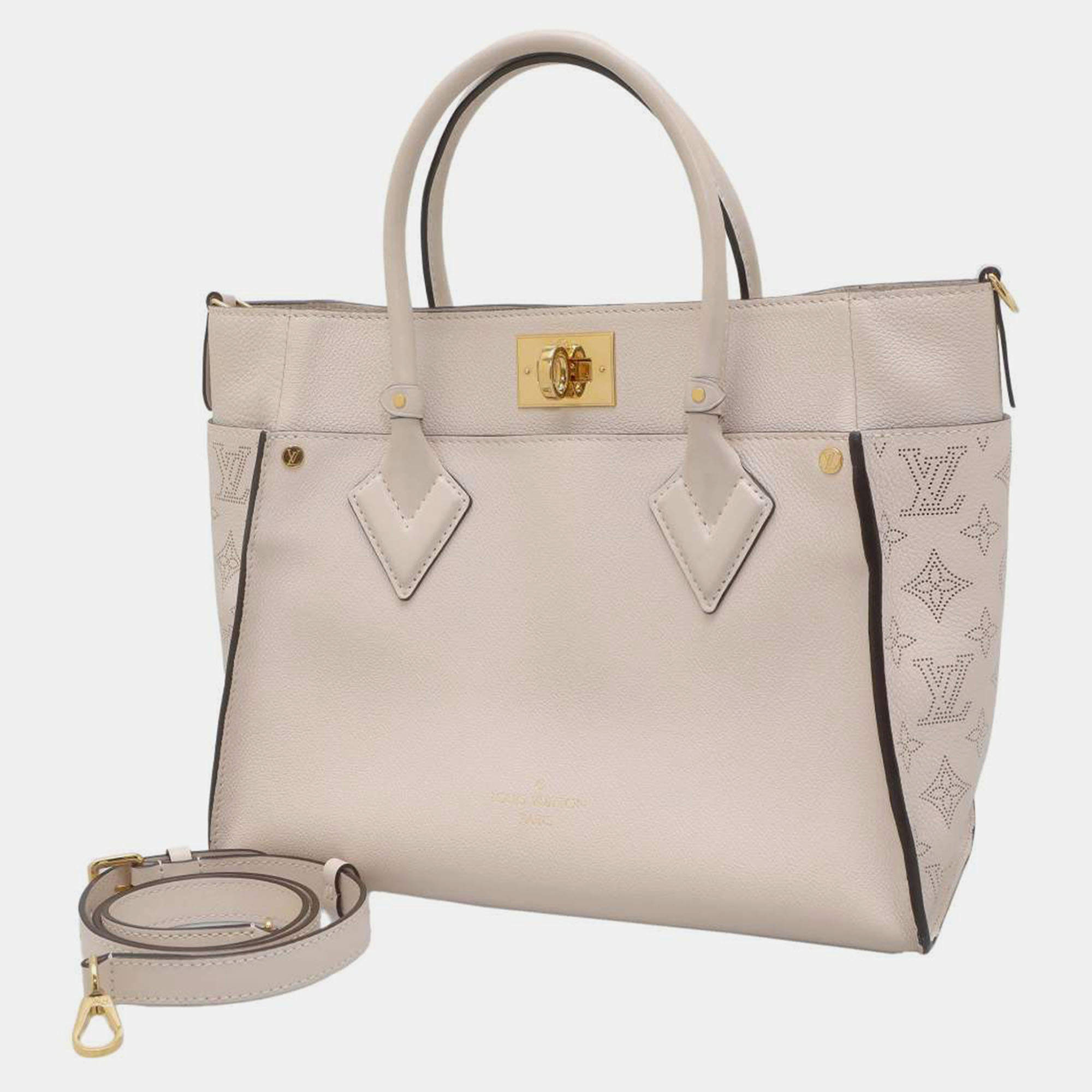 On my side leather handbag Louis Vuitton Beige in Leather - 31347060