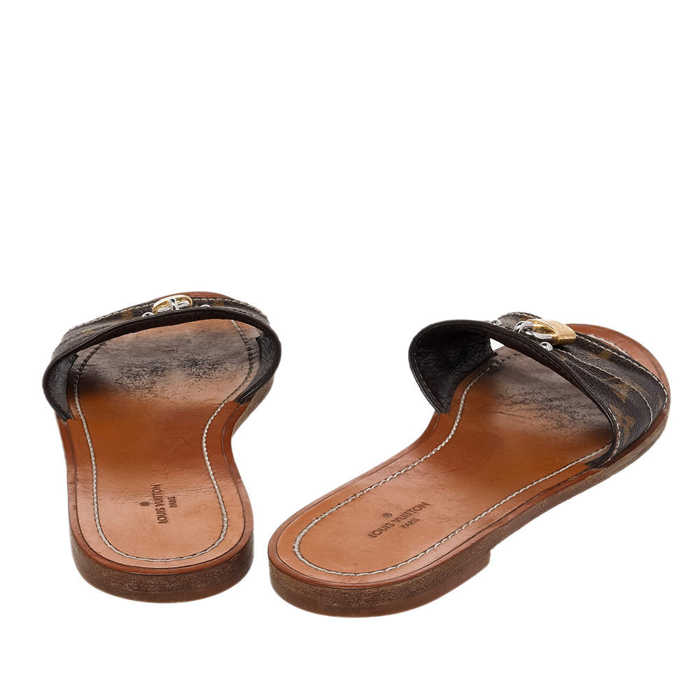 Lock it leather sandals Louis Vuitton Brown size 37.5 IT in Leather -  19523556
