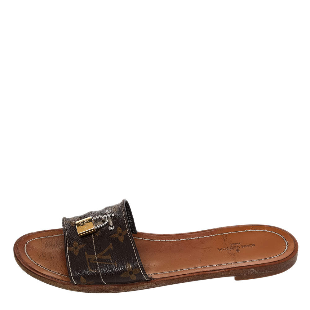 Louis Vuitton Brown Coated Monogram Canvas Lock It Flat Slides Size 41 Louis  Vuitton