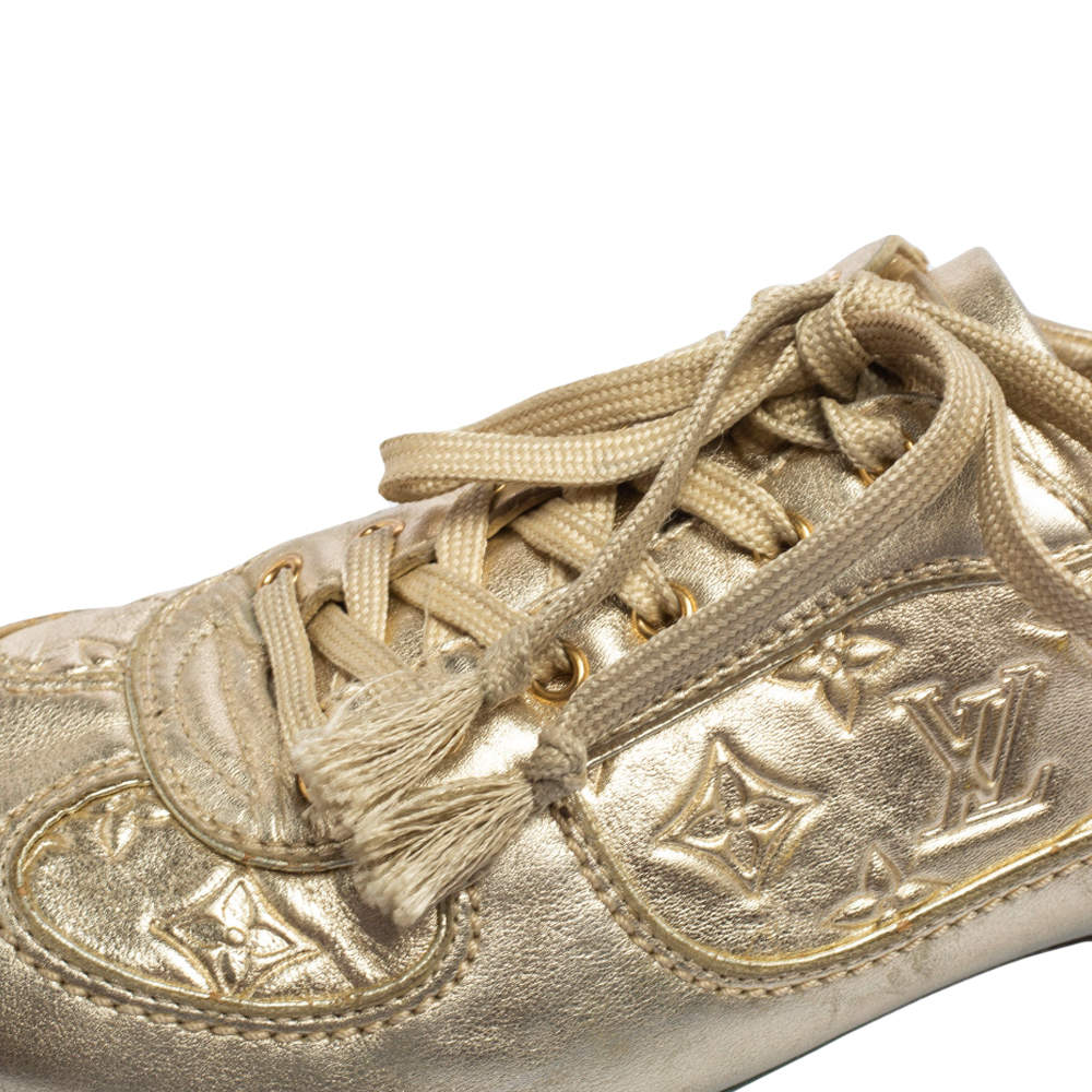 Louis Vuitton Women's Size 36 Ultra Rare Metallic Gold High Top Sneakers  Leather White gold ref.326240 - Joli Closet