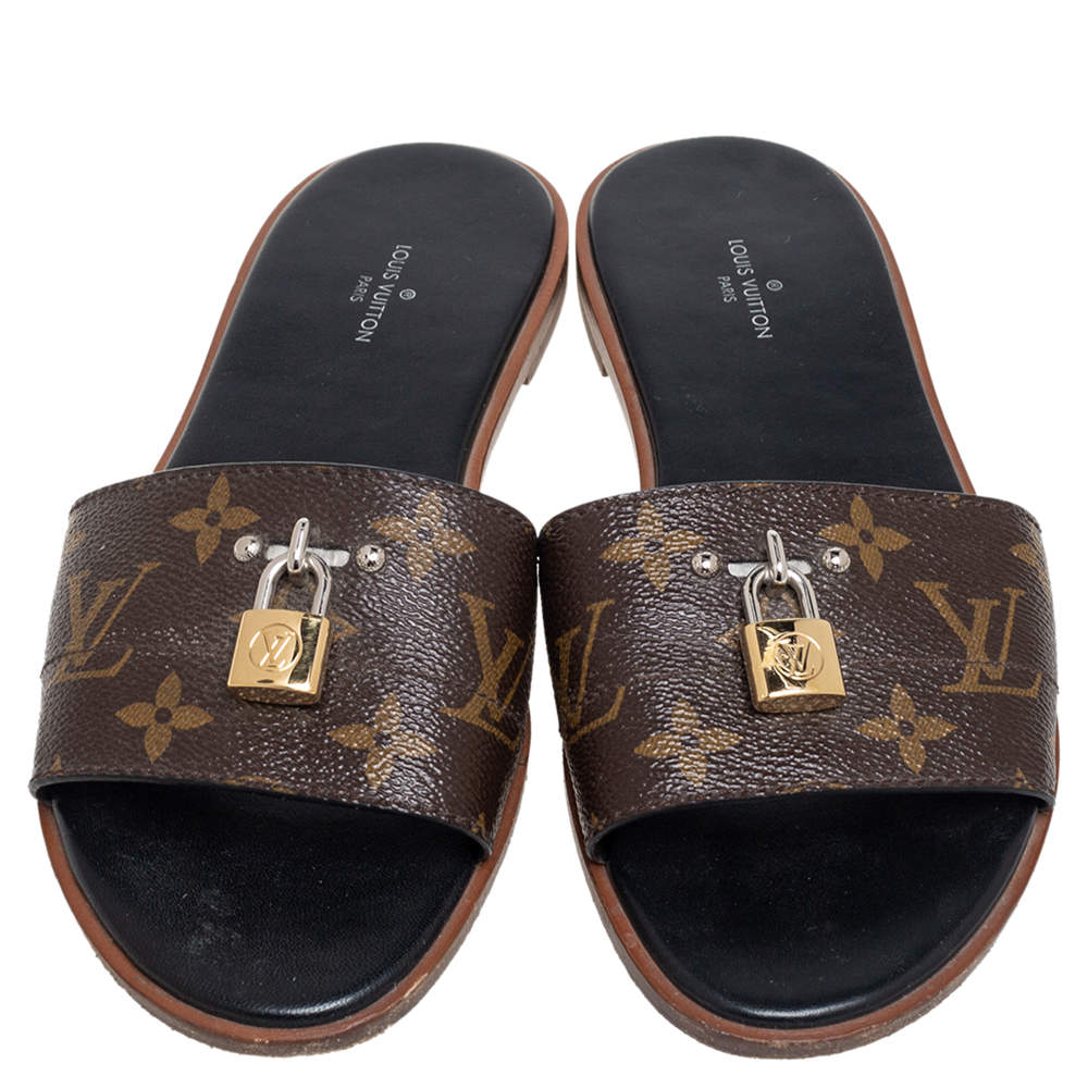 Lock it leather sandals Louis Vuitton Brown size 38 EU in Leather - 35938749