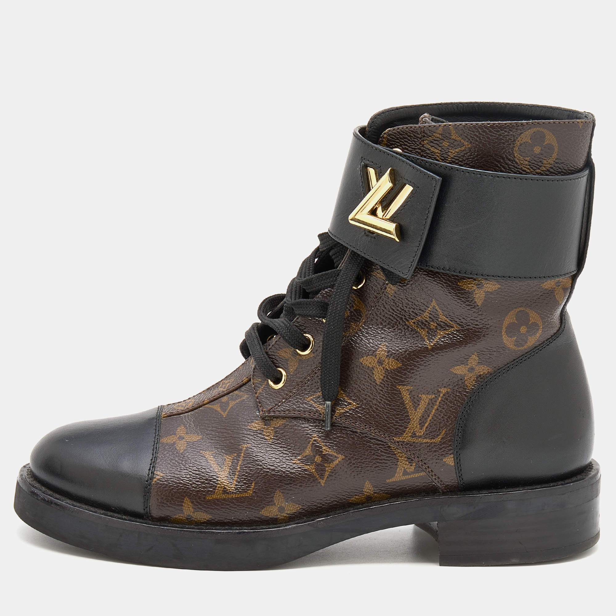 Wonderland leather biker boots Louis Vuitton Khaki size 38.5 EU in